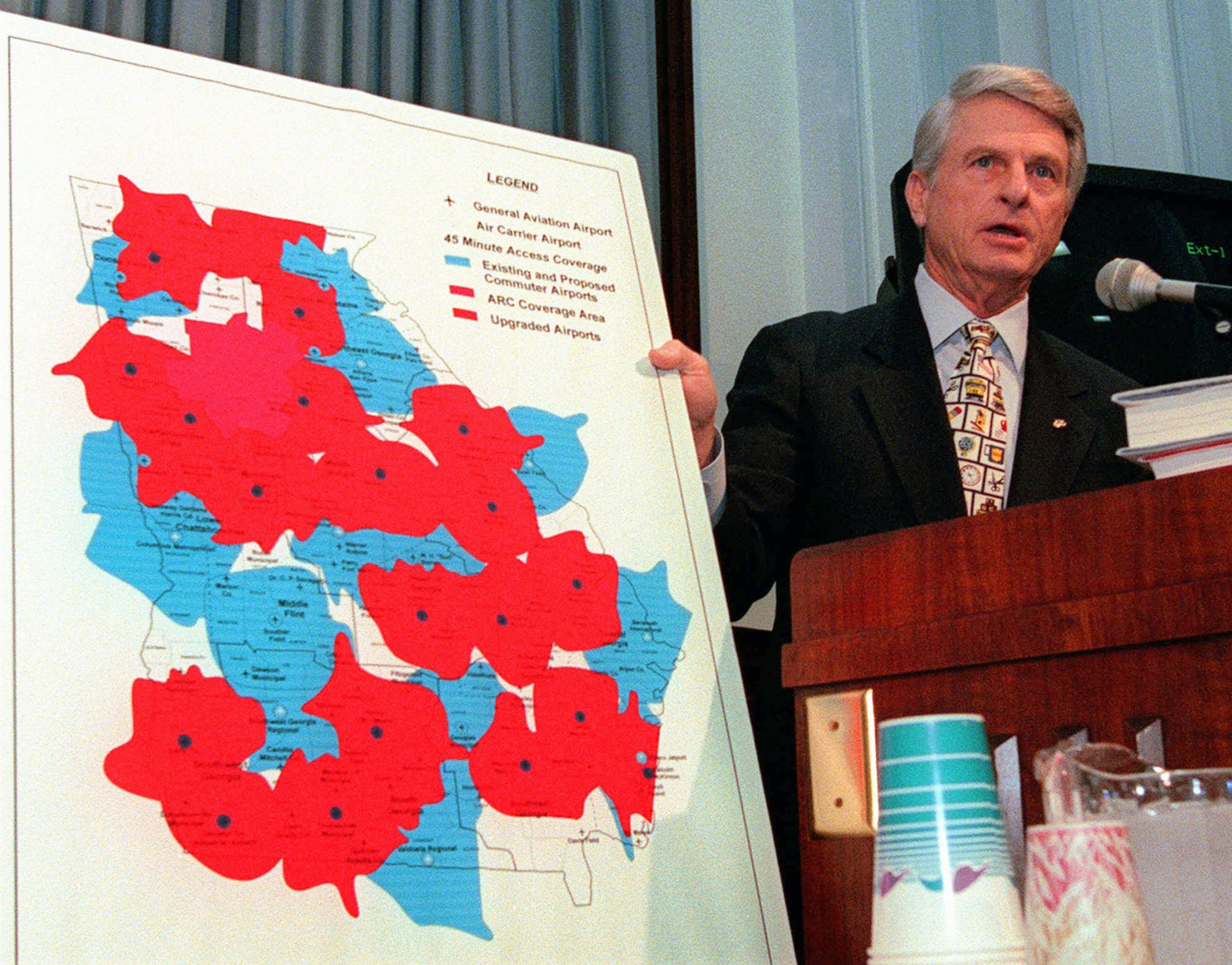Gov. Zell Miller uses a map Monday, Jan. 5, 1998, to emphasize his 1998 amended budget proposal to utilize $35 million in grants to upgrade and/or expand 27 general aviation airports throught Georgia to regional status to meet the economic needs of the state in attracting business to all areas of the state. The governor outlined the highlights of his budget proposals during budget hearings at the Capitol in Atlanta. (AP Photo/Ric Feld)