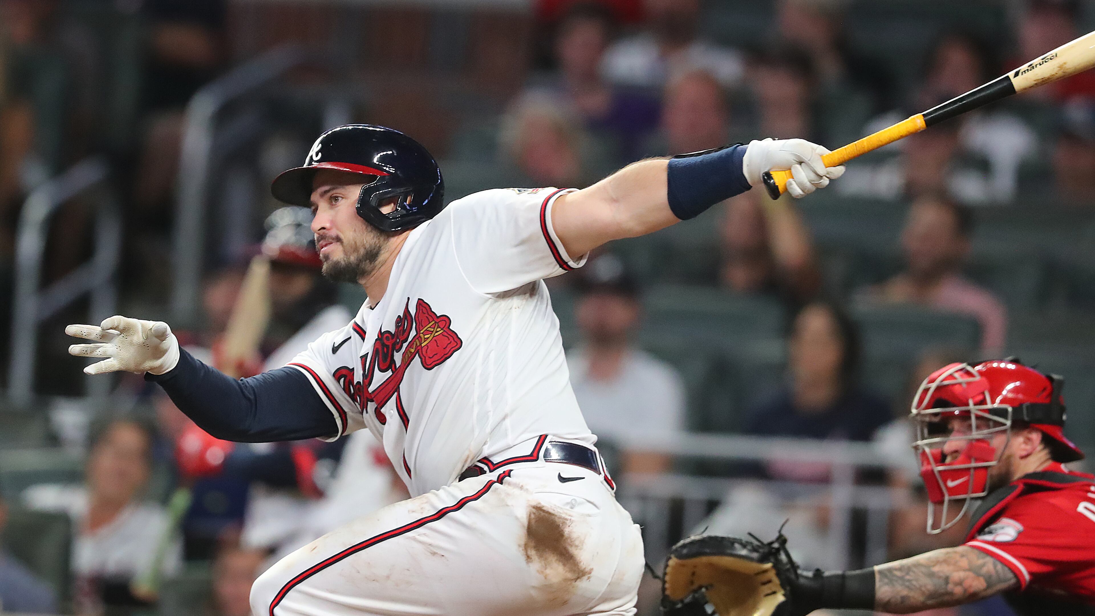 Braves catcher Travis d'Arnaud rips a single against the Cincinnati Reds during the sixth inning Wednesday, Aug.11, 2021, in Atlanta. (Curtis Compton / Curtis.Compton@ajc.com)