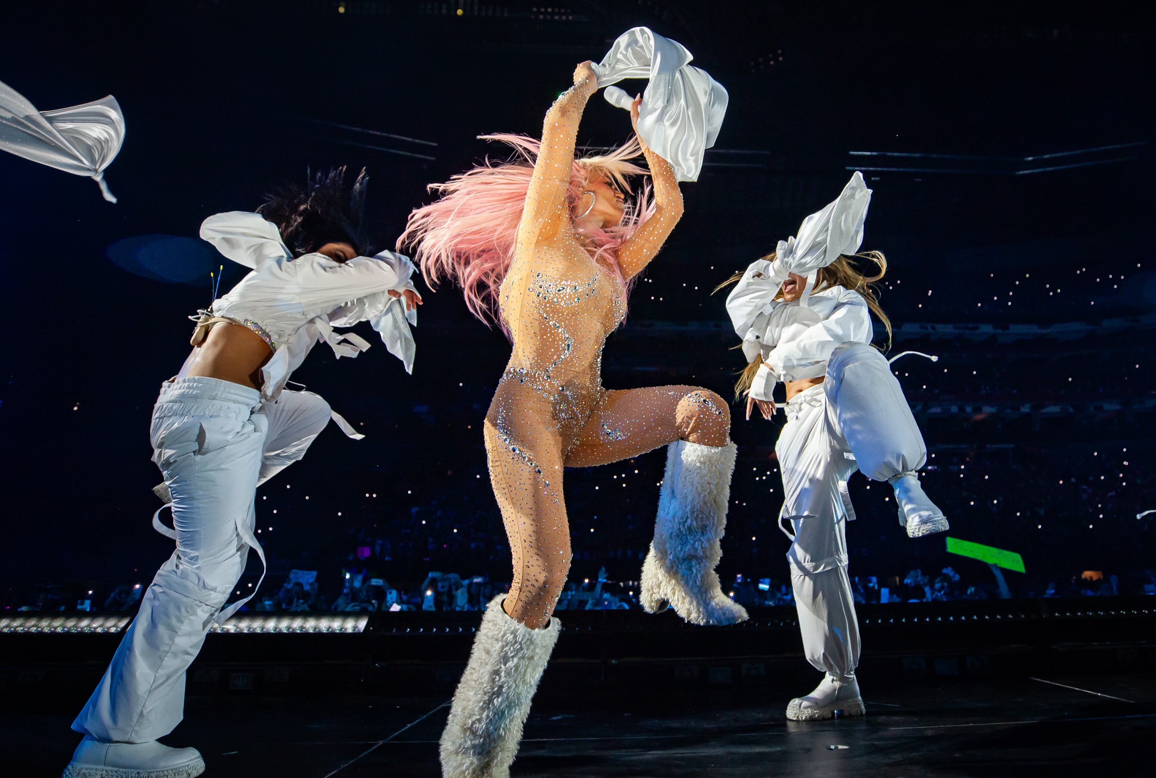 Karol G brought a stunning performance to Mercedes-Benz Stadium on Thursday, Sept. 21, 2023,where the throng of fans showed up in their best Karol G-inspired outfits. (Ryan Fleisher FOR THE ATLANTA JOURNAL-CONSTITUTION)