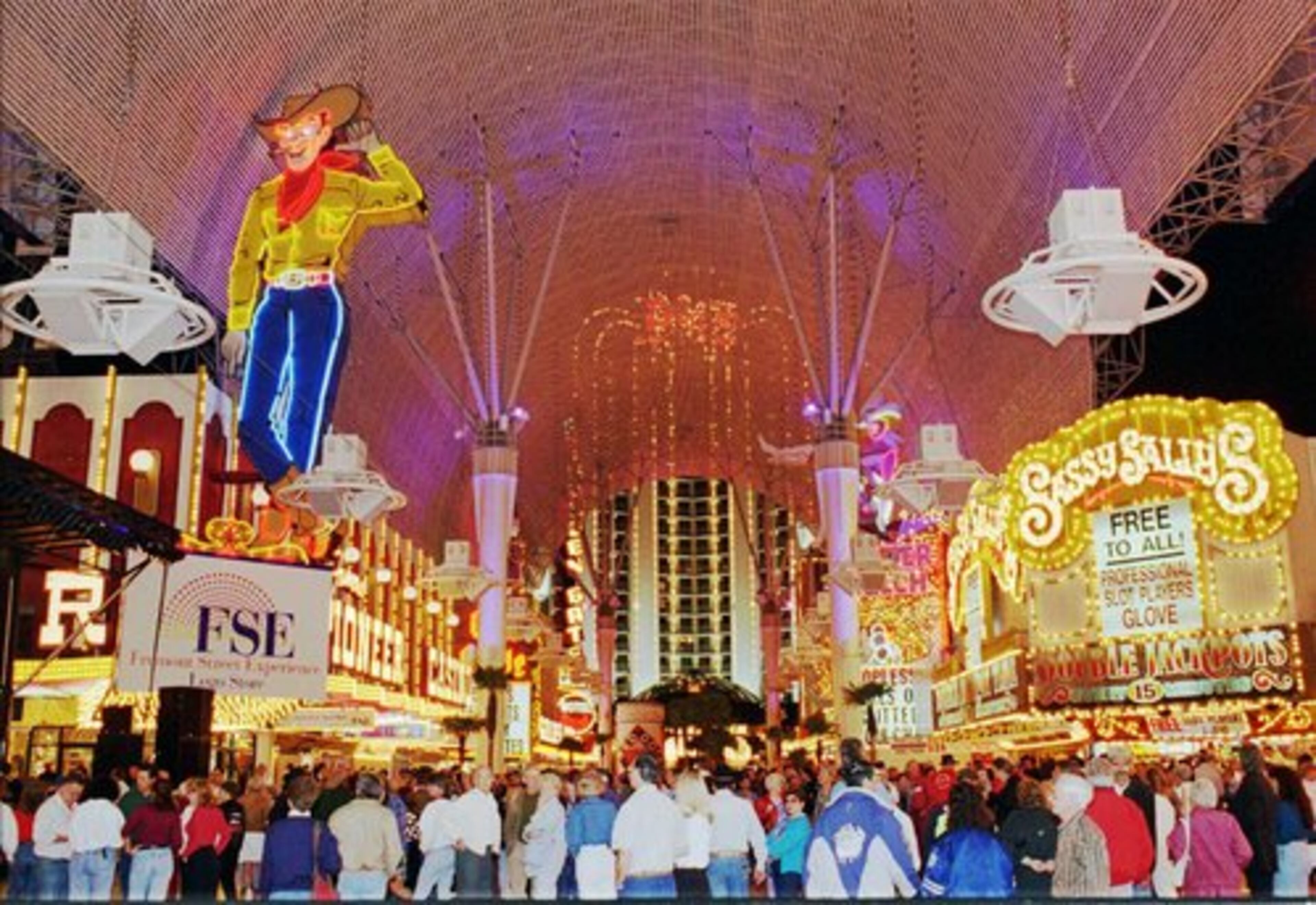 FREMONT STREET is downtown, off the Strip. It's the site of the older casinos and is now referred to as the Fremont Street Experience.