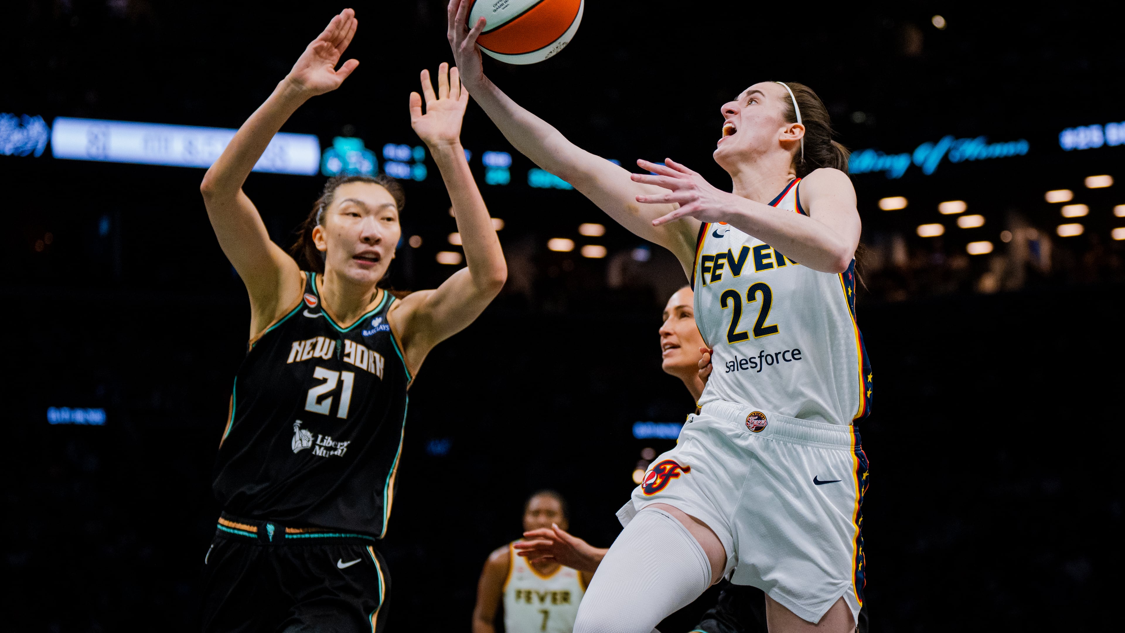 Indiana Fever guard Caitlin Clark (22) shoots a two-pointer during the second half of a WNBA basketball game against the New York Liberty, Saturday, Aug. 22, 2026, in New York. (AP Photo/Angelina Katsanis)