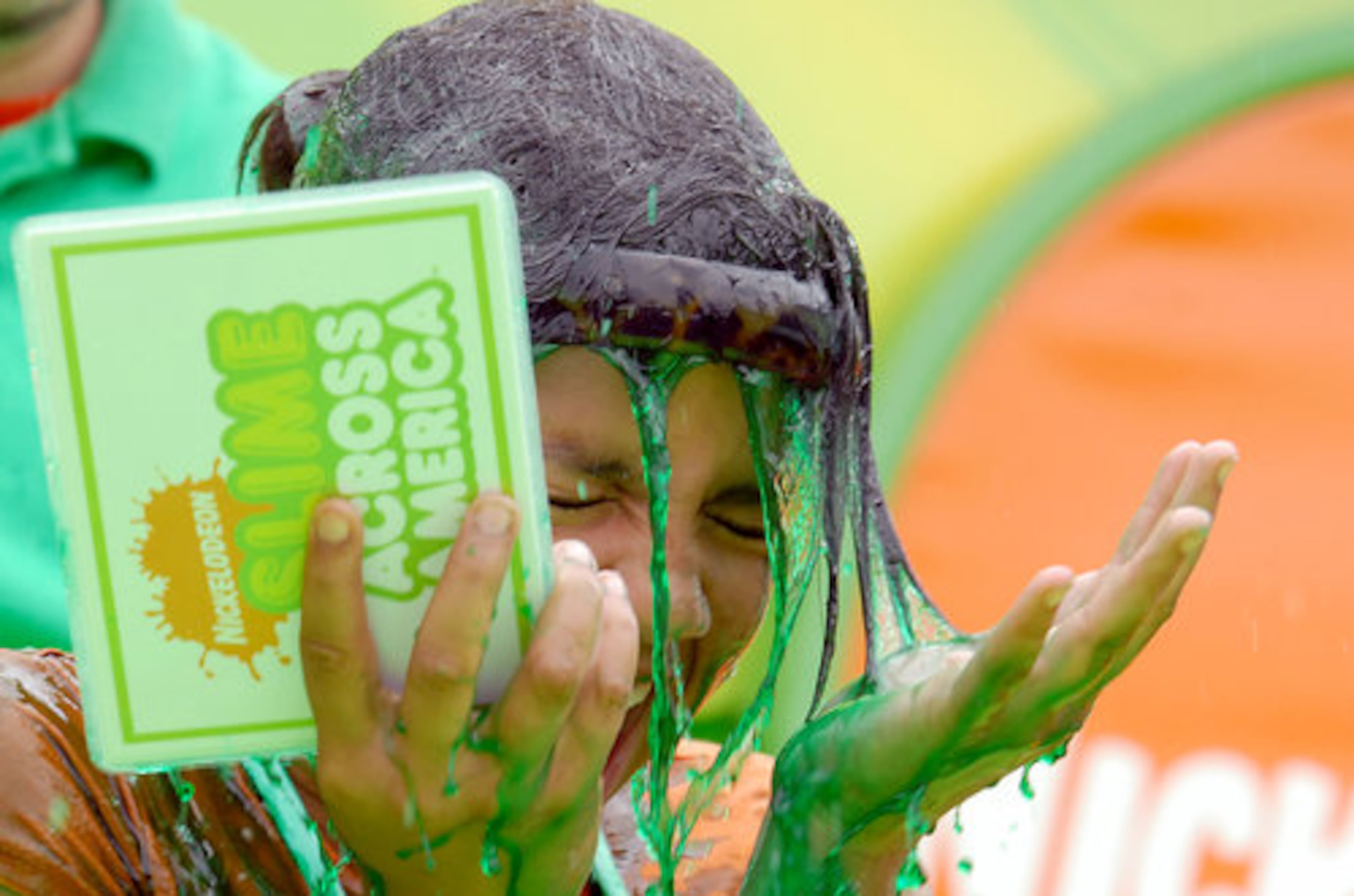 Contestant Lauren Griffith, 12, gets slimed on stage during a contest with other children participating in the Nickelodeon Slime Across America 2008 tour.