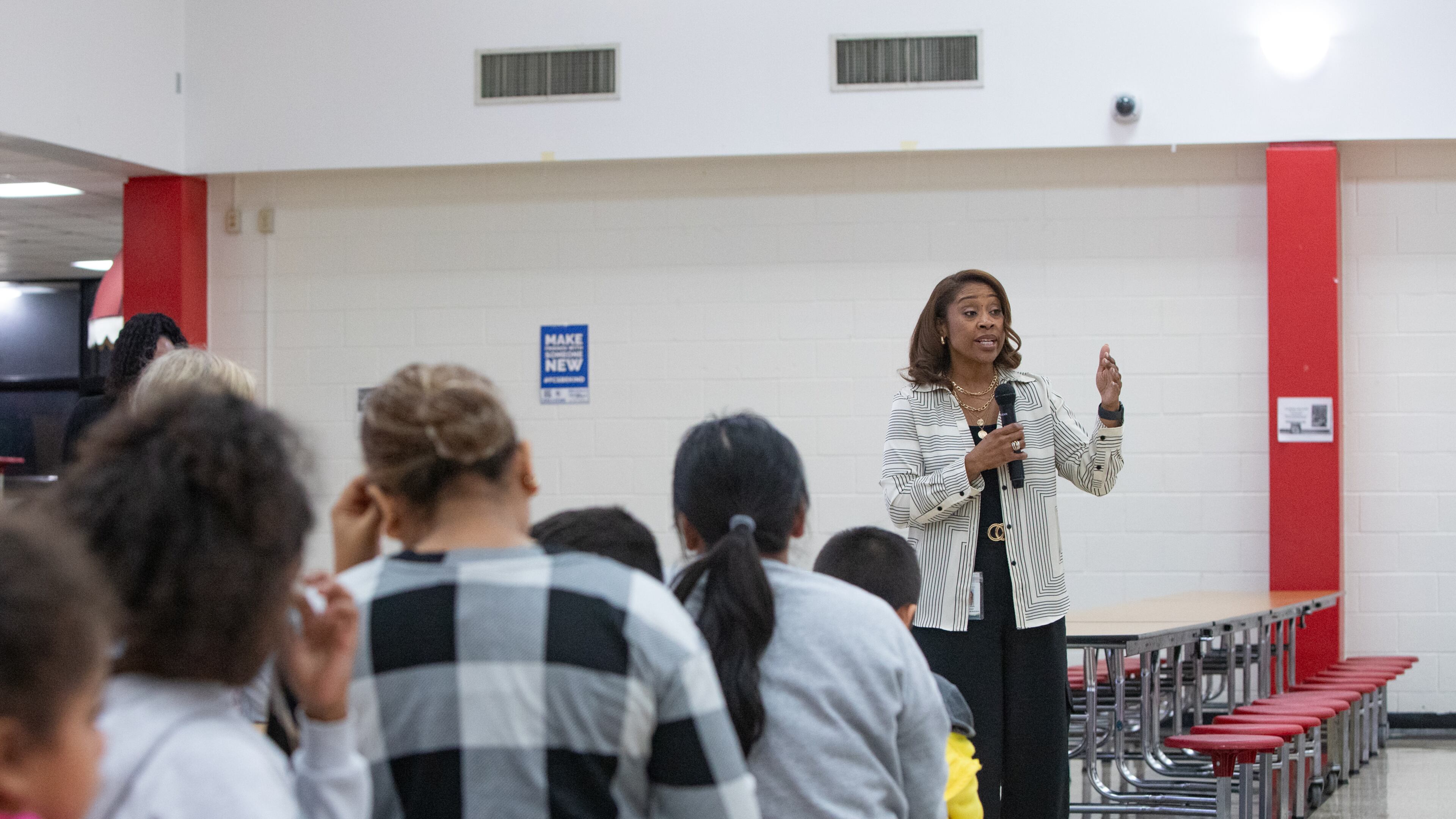 Yngrid Huff, deputy chief operations officer of Fulton County Schools, addresses questions and tries to clarify the process of plans to close Spalding Drive Elementary School and Parklane Elementary School on Wednesday, Nov. 6, 2024. (Jenni Girtman for the AJC)