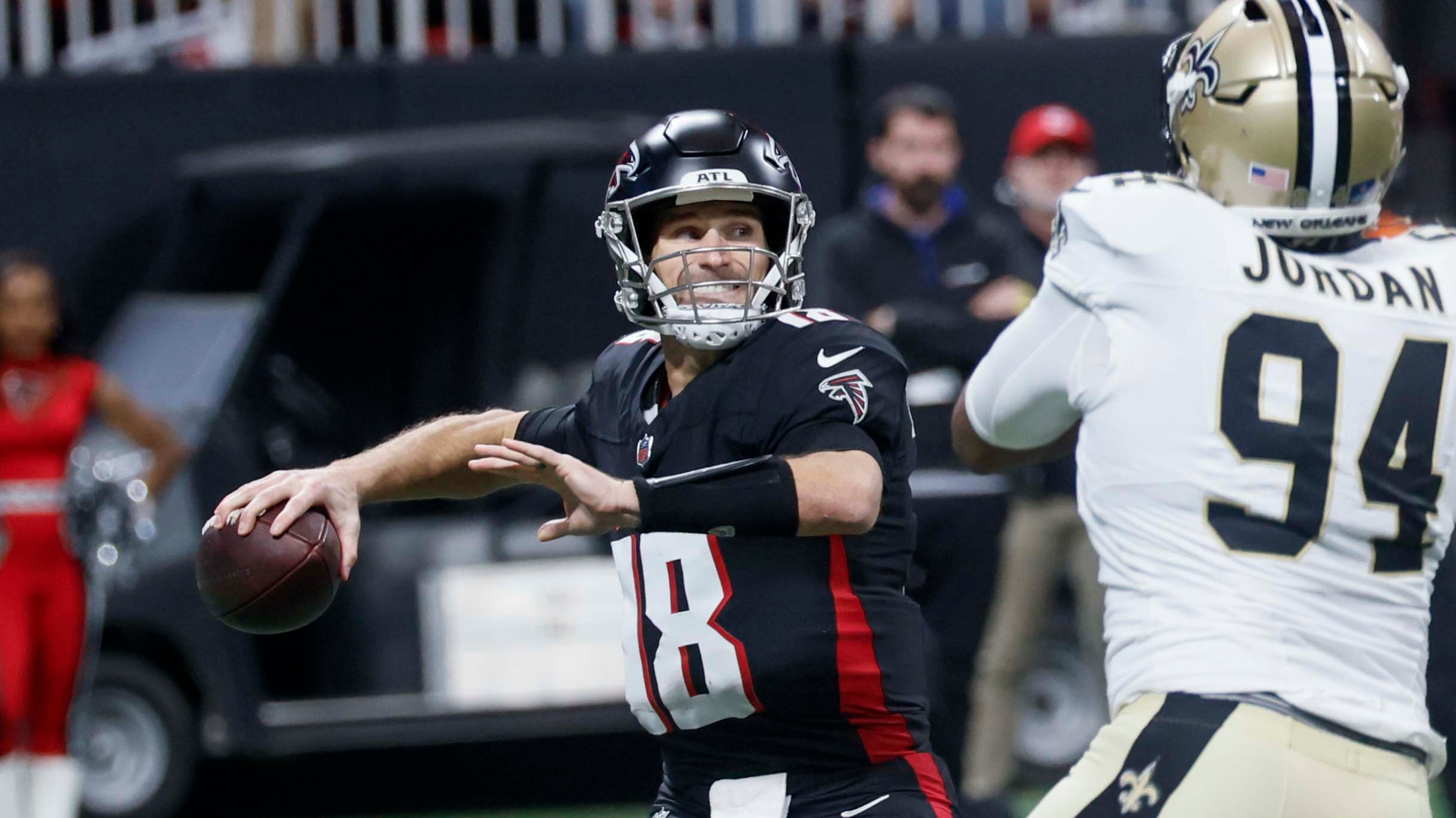 Falcons quarterback Kirk Cousins attempts a pass against the Saints in January in what would be his final game in Atlanta. But it was another game against New Orleans, in November 2024, that signaled the beginning of the end of Cousins' Falcons tenure. (Miguel Martinez/AJC)