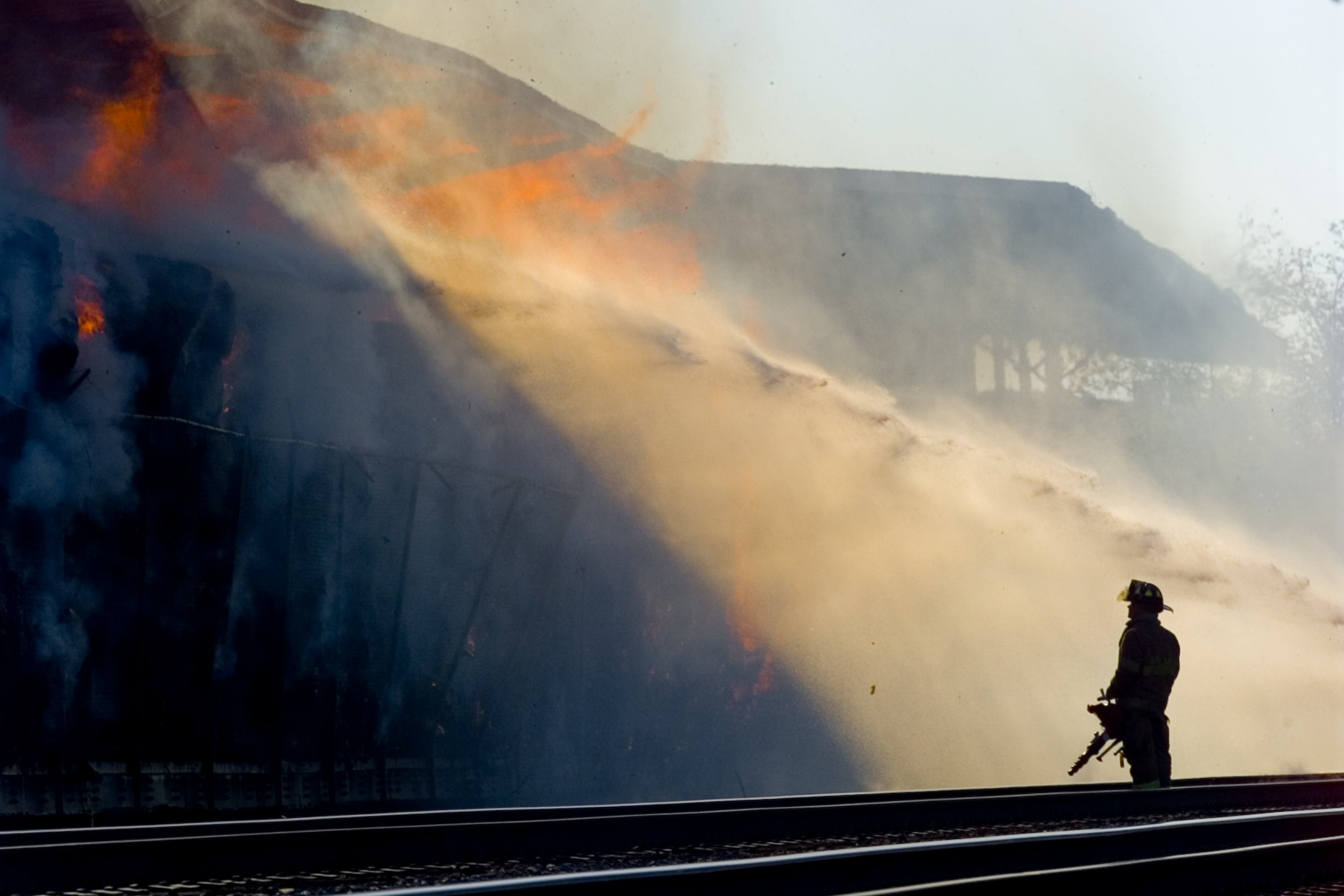 01/30/01-JOHN SPINK/staff-ATLANTA/FULTON COUNTY- Atlanta Fire companies responded to a 2 alarm blaze Tuesday mid-morning at the former GM plant which is now Busy Paper Recycling at 319 McDonough Blvd. Stacks of recycled bundles of cardboard were ablaze where flumes of smoke could be seen all around the area. Fire comapnies expected to be on the scene most of the day. Cause of the blaze is unknown at this time.