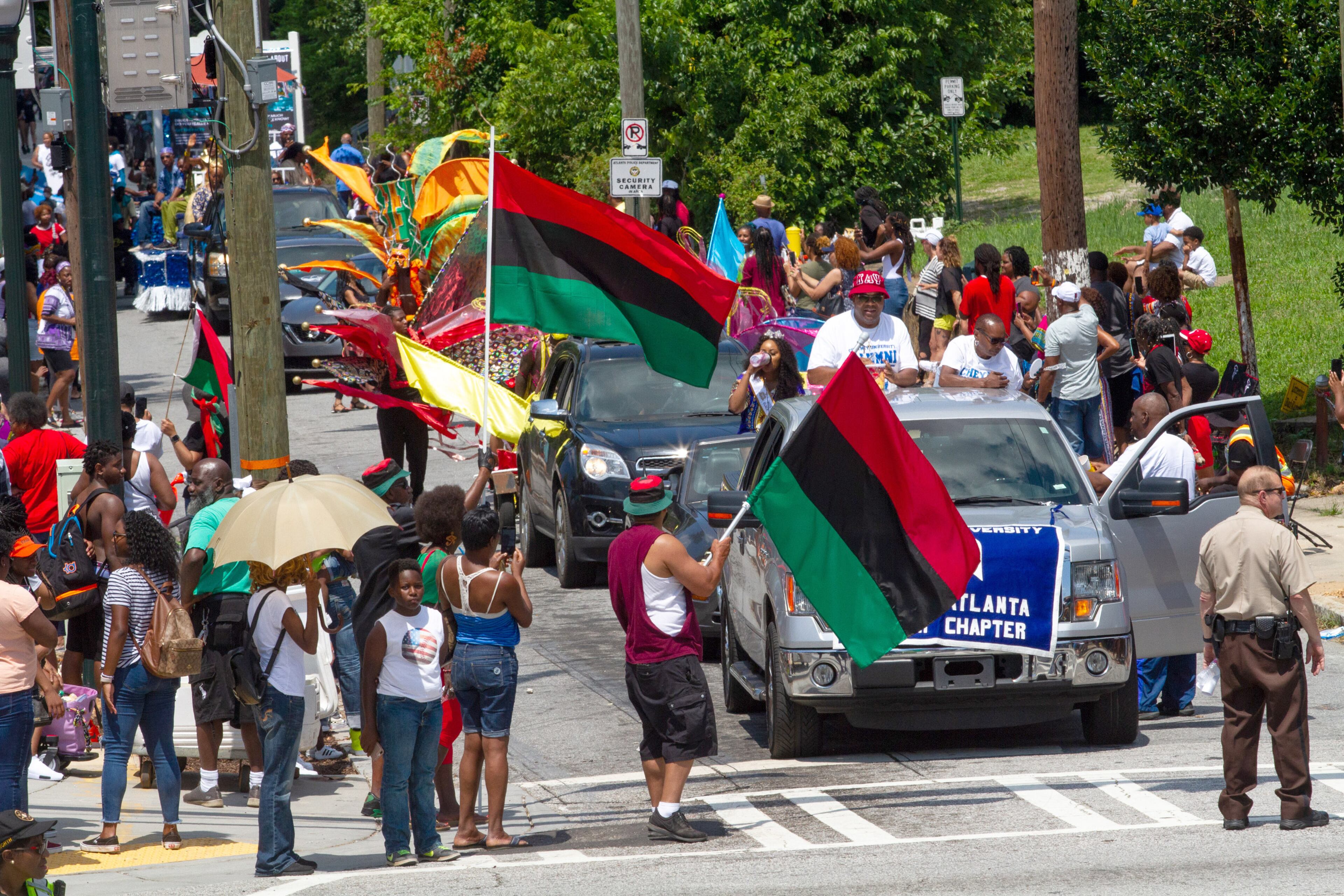 The Juneteenth Atlanta Black History Parade makes its way across Northside Dr. into The Home Depot Backyard at the Mercedes-Benz Stadium on Saturday, June 15, 2019. STEVE SCHAEFER / SPECIAL TO THE AJC