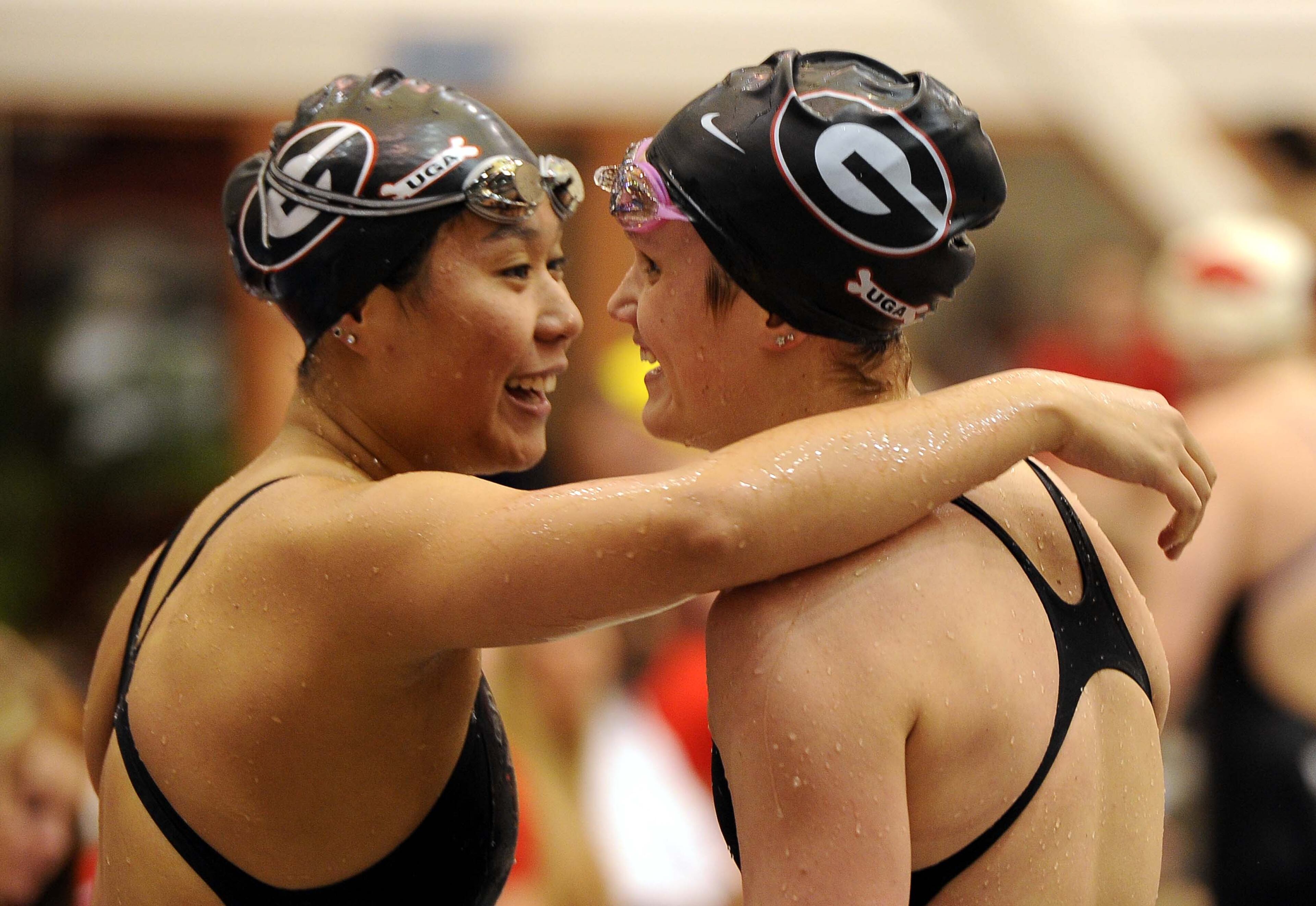 Annie Zhu and Shannon O'Malley after the breastsroke during day five of the SEC Swimming and Diving Championships prelims held at the Gabrielsen Natatorium on Friday, Feb. 22, 2014 in Athens, Ga.