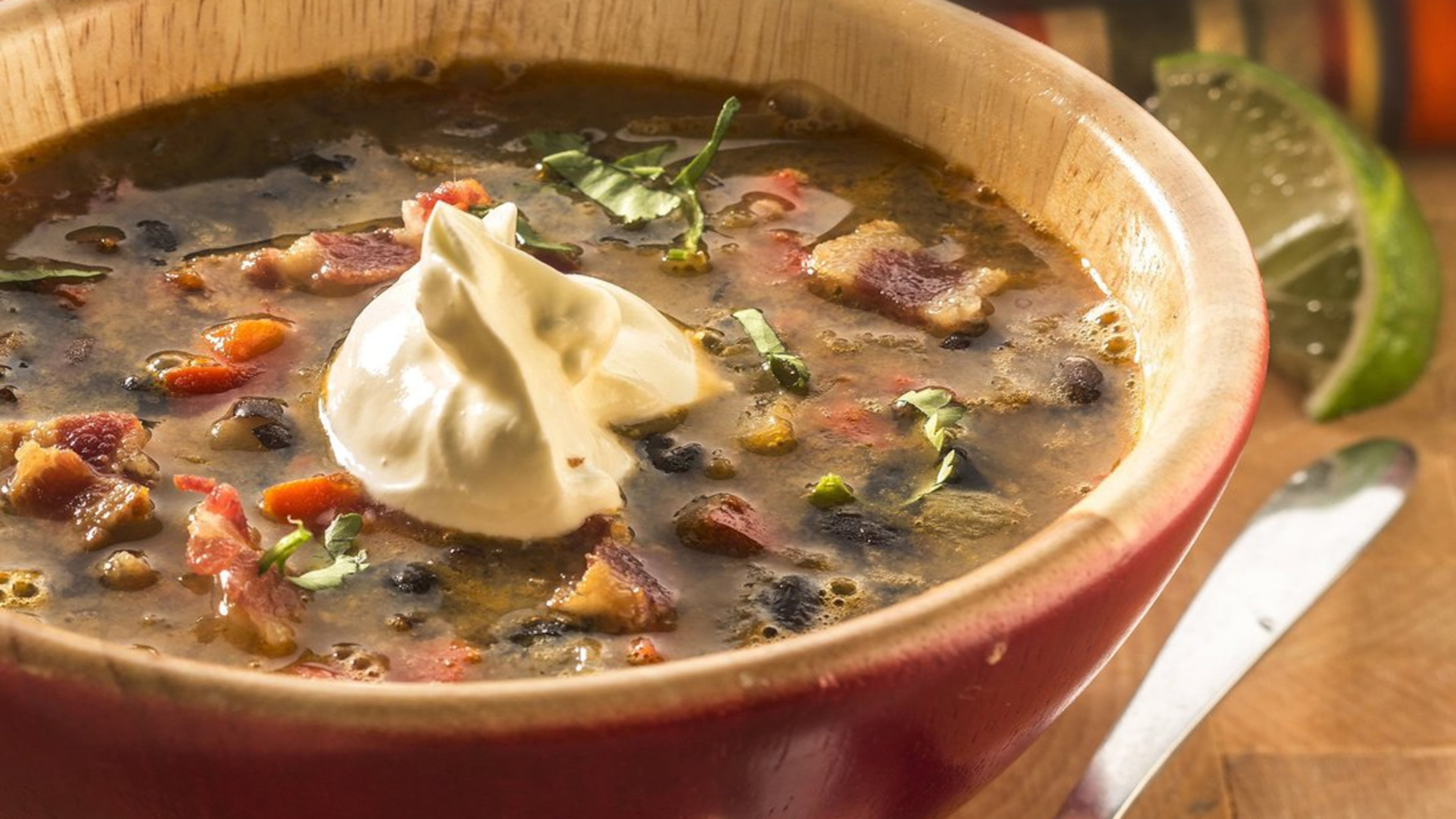 Make a can of black beans into something altogether different with bacon, sauteed red bell peppers and onions, and a hit of oregano. (Bill Hogan/Chicago Tribune/TNS)