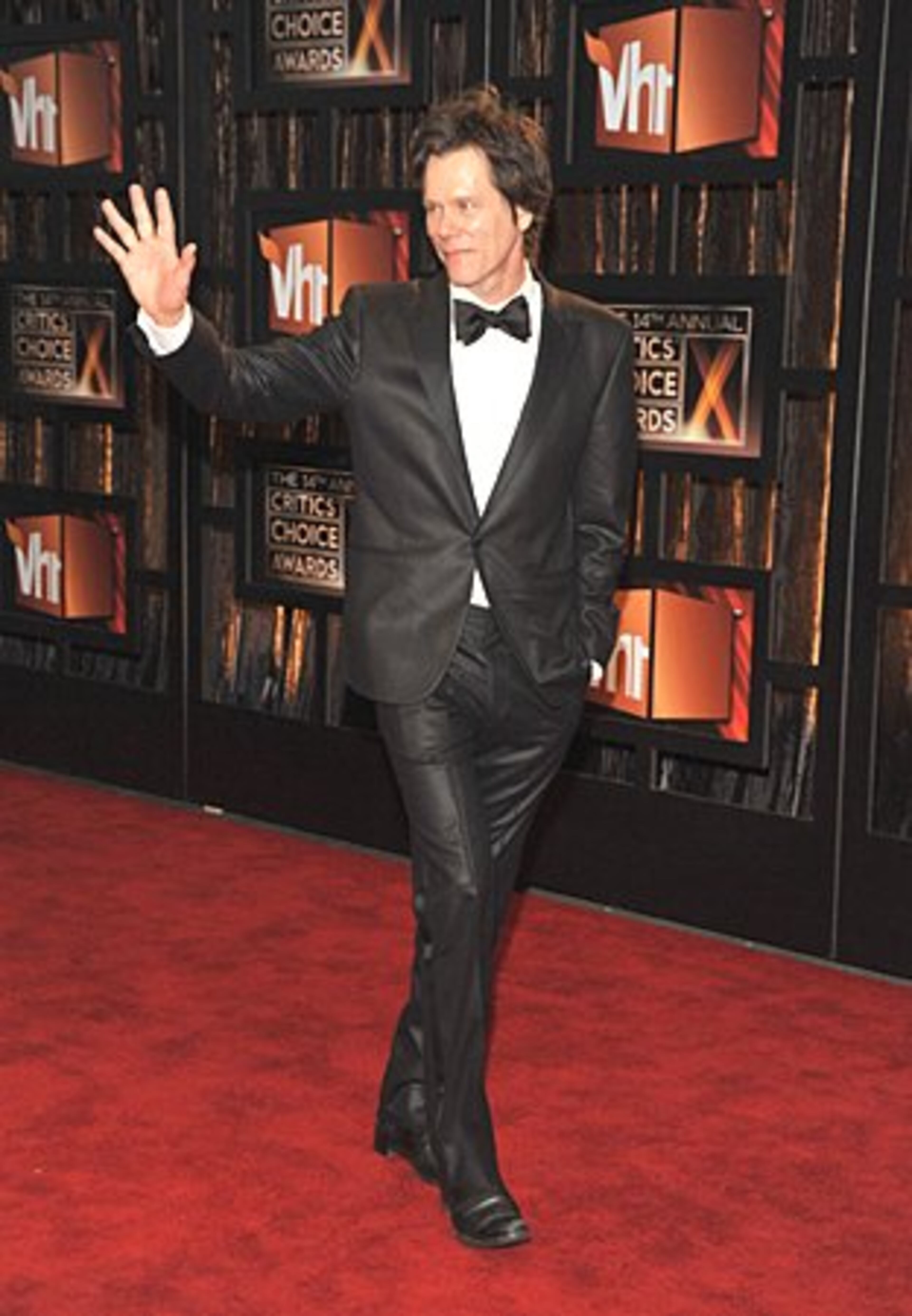 Actor Kevin Bacon arrives.