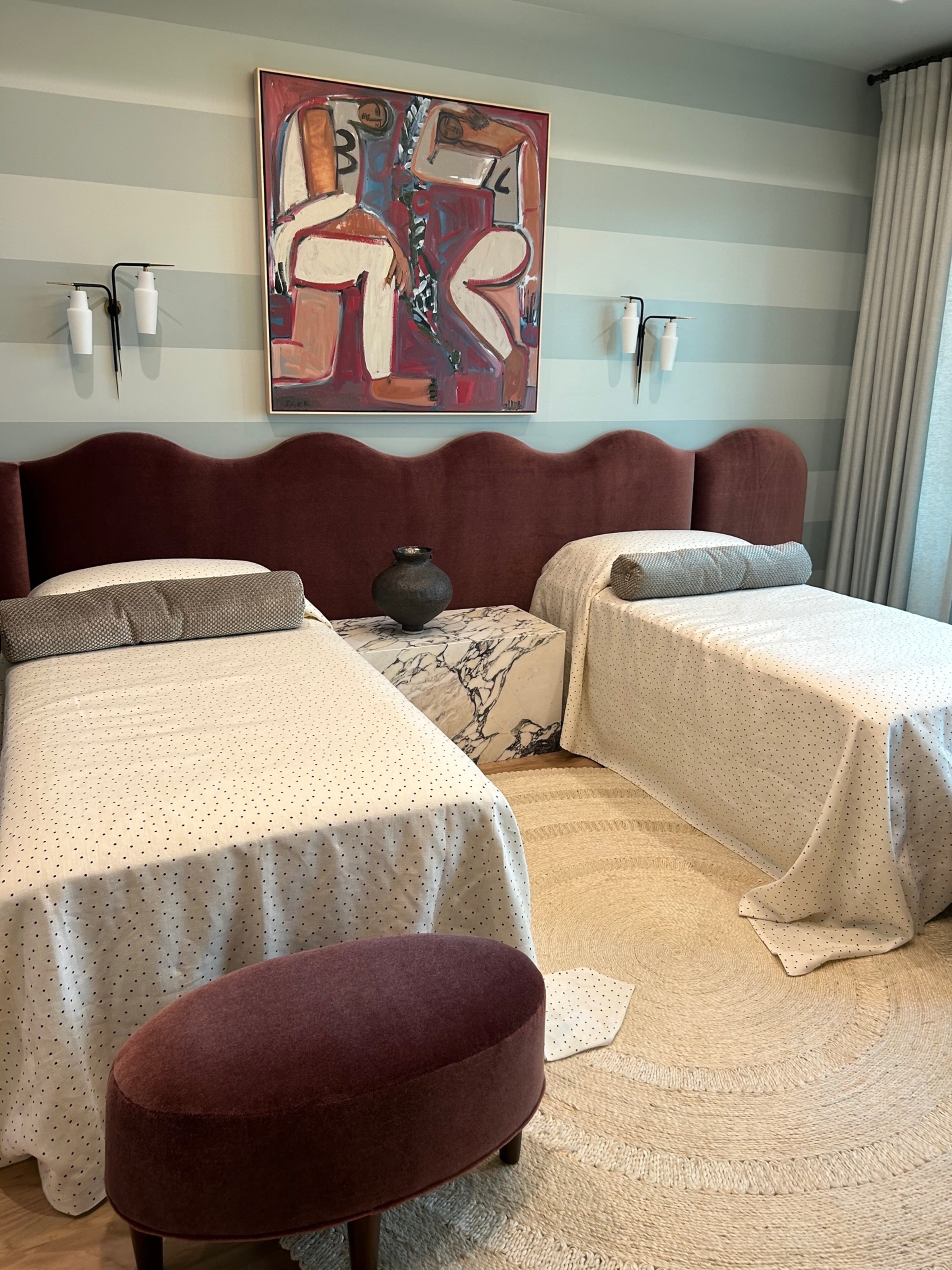 Impactful walls, such as this one painted in horizontal stripes, and a mix of art deco and 1980s style are on display at the 2023 Serenbe Designer Showhouse. Photo: Felicia Feaster for the AJC