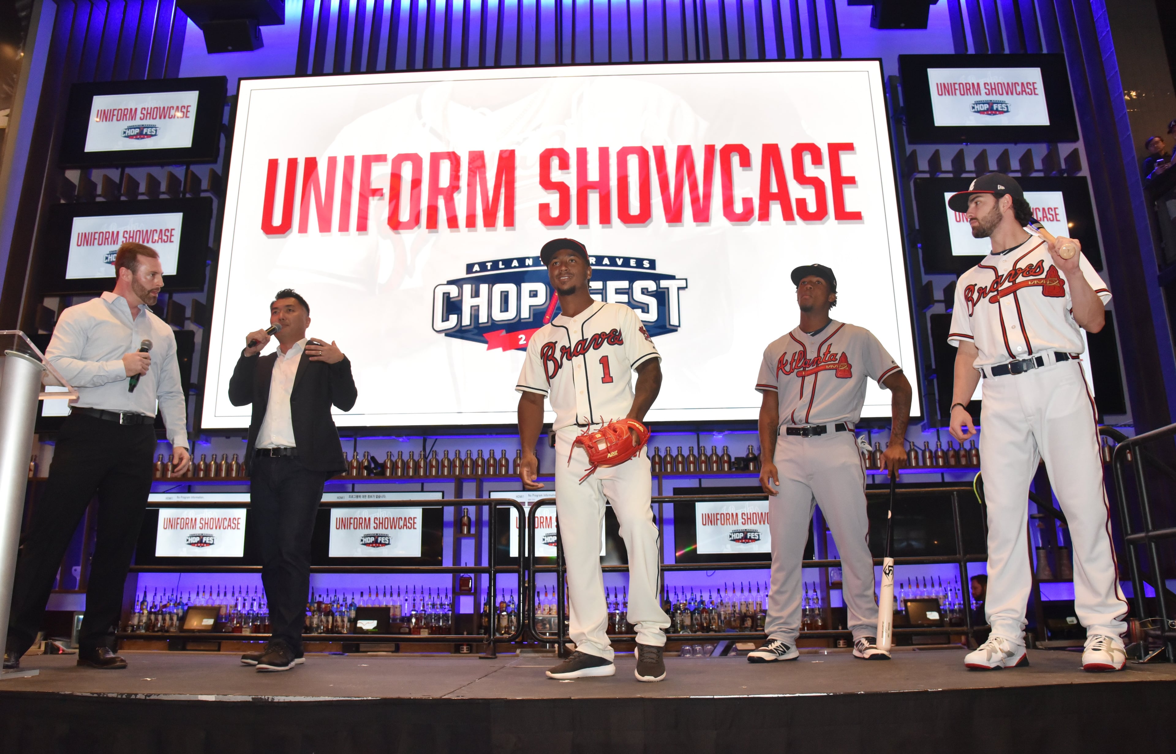 January 19, 2019 Atlanta - Atlanta Braves second baseman Ozzie Albies (center) shows off Home Cream Uniform during 2019 Uniform Showcase event at LIVE! at The Battery Atlanta as a part of Atlanta Braves 2019 Chop Fest events on Saturday, January 19, 2019. The Bravesâ annual Chop Fest fan event was hold Saturday at SunTrust Park and The Battery Atlanta. Activities include baseball clinics, autograph sessions, photo opportunities with players, interactive attractions, live entertainment and Q&A sessions. HYOSUB SHIN / HSHIN@AJC.COM
