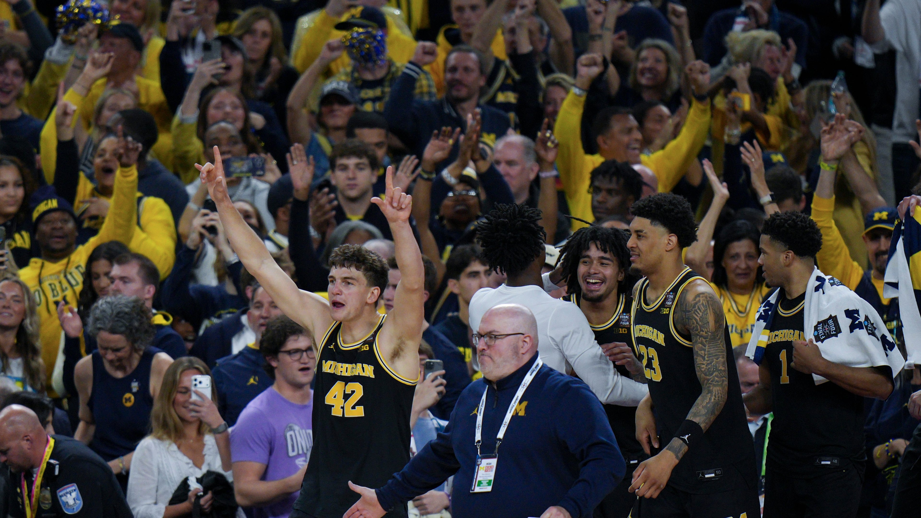 Michigan forward Will Tschetter (42) celebrates after an NCAA college basketball tournament semifinal game against Arizona at the Final Four, Saturday, April 4, 2026, in Indianapolis. (AP Photo/AJ Mast)