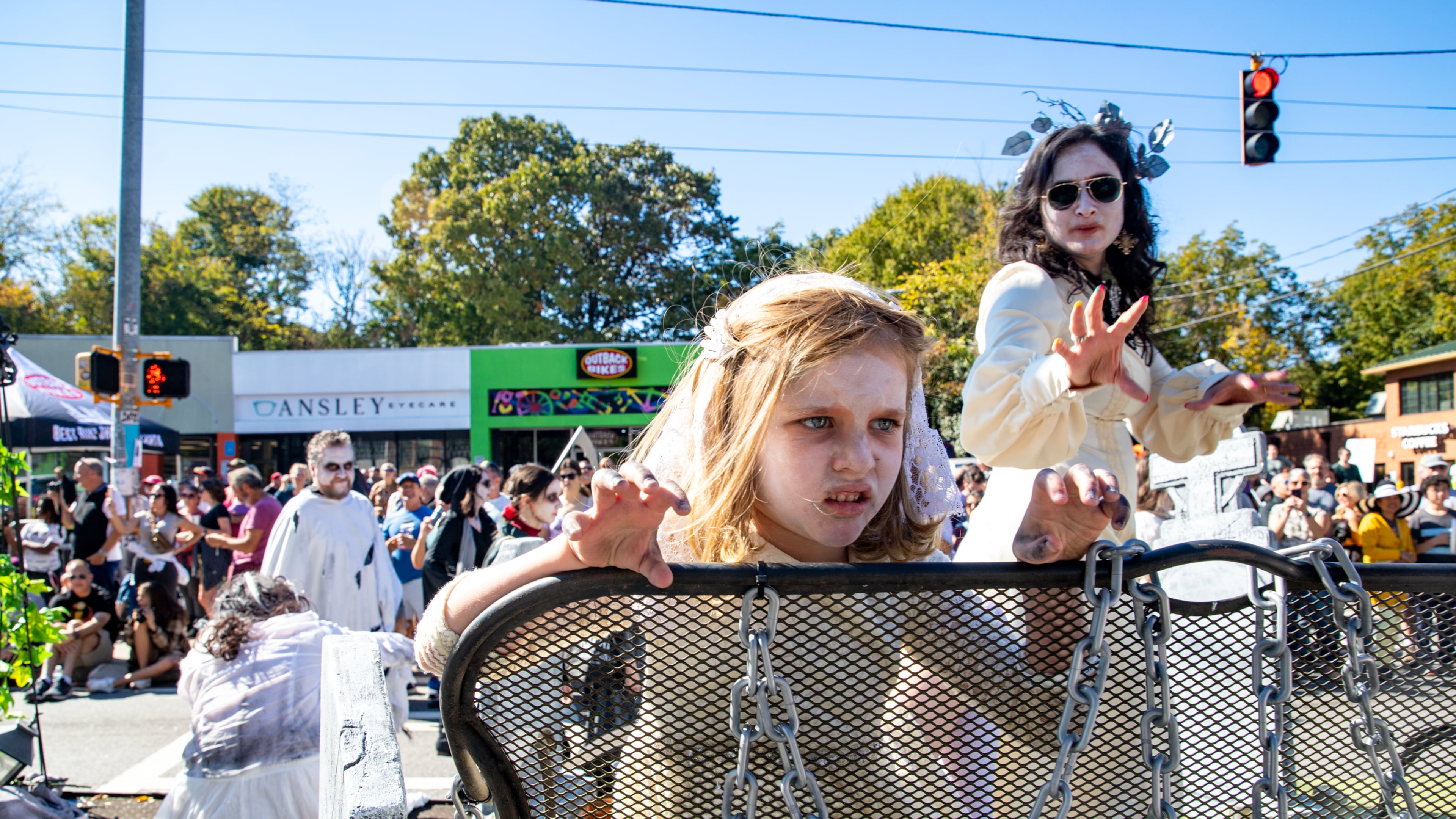 5-year-old Violet Buice terrifies in the annual Little Five Points Halloween Parade on Sunday, Oct 23, 2022. (Jenni Girtman for The Atlanta Journal-Constitution)