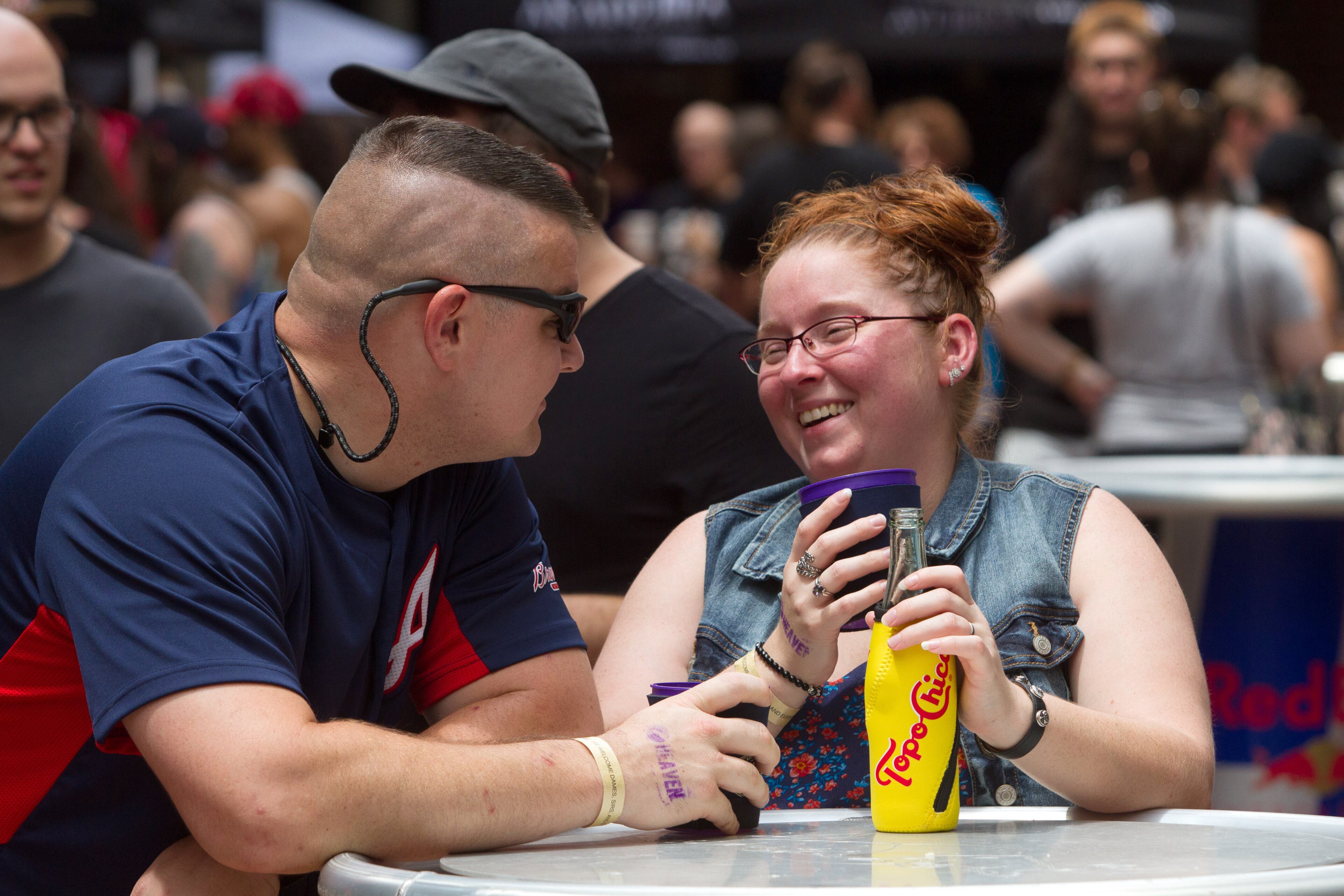 Joshua Reynolds and Kandie Reynolds enjoy a refreshment during The Dames + Dregs Beer Festival at Kenny's Alley in Atlanta GA August 11, 2018. STEVE SCHAEFER / SPECIAL TO THE AJC