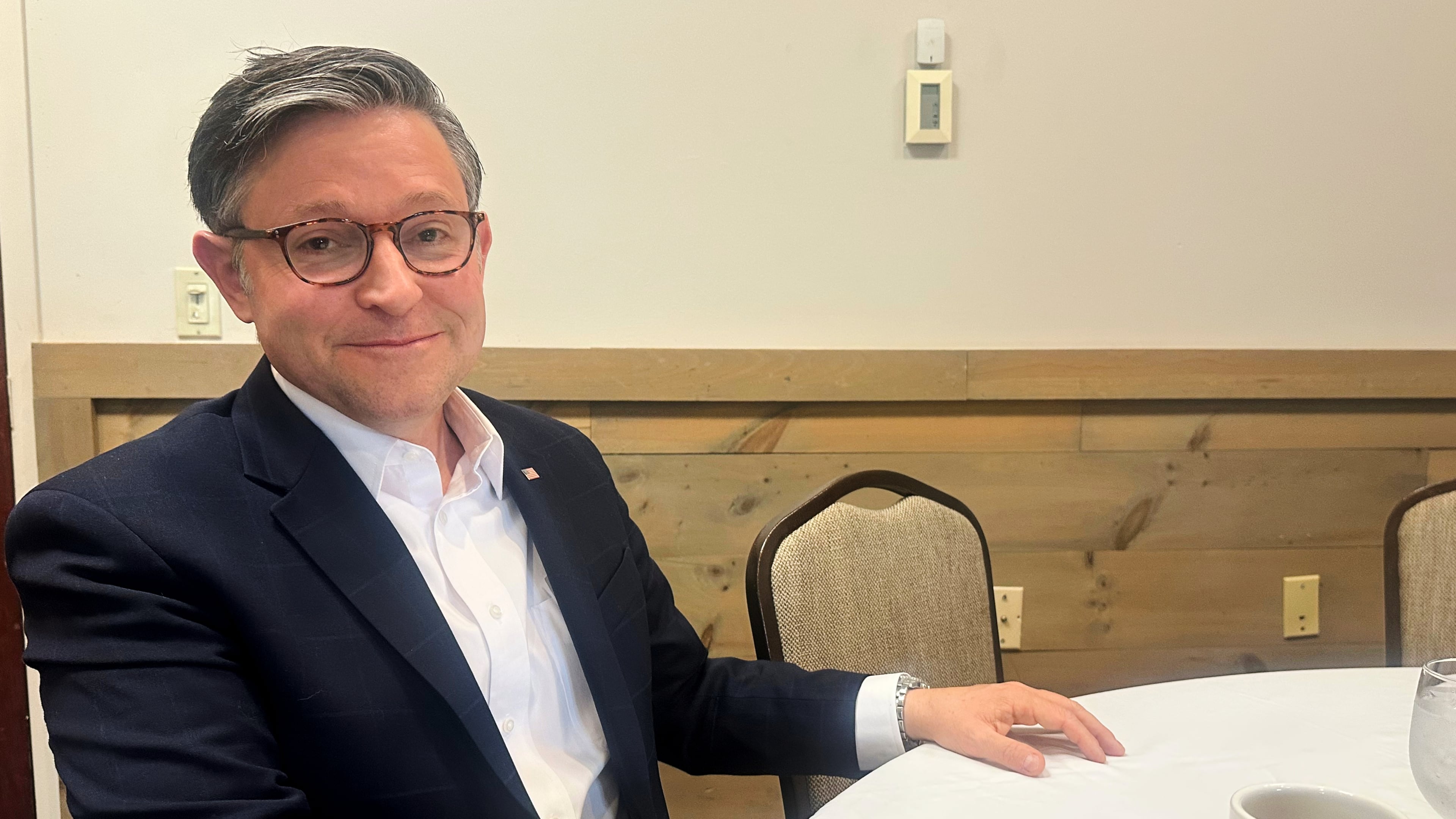 In this photo taken with a smart phone, House Speaker Mike Johnson sits for an AP interview during a campaign stop, Wednesday, Oct. 14, 2026, in Bangor, Maine. (AP Photo/Lisa Mascaro)