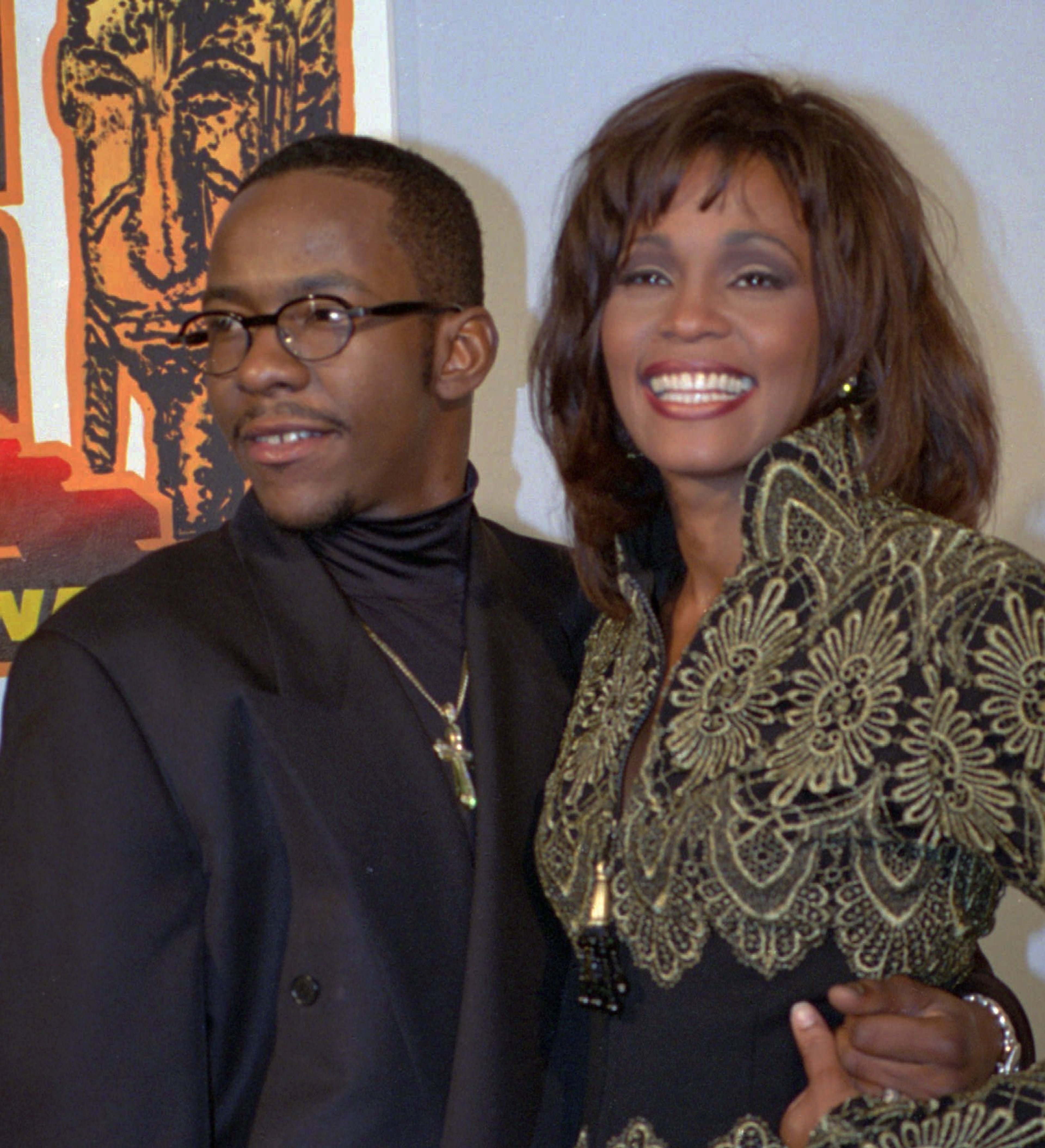 Whitney Houston poses with husband Bobby Brown after receiving two awards at the Soul Train Music Awards ceremonny in Los Angeles March 15, 1994. Houston won best R & B song of the year for "I Will Always Love You," from the movie "The Bodyguard." She was also honored with the Sammy Davis Jr. Award for the year's top entertainer.(AP Photo/Rhoda Birndorf)