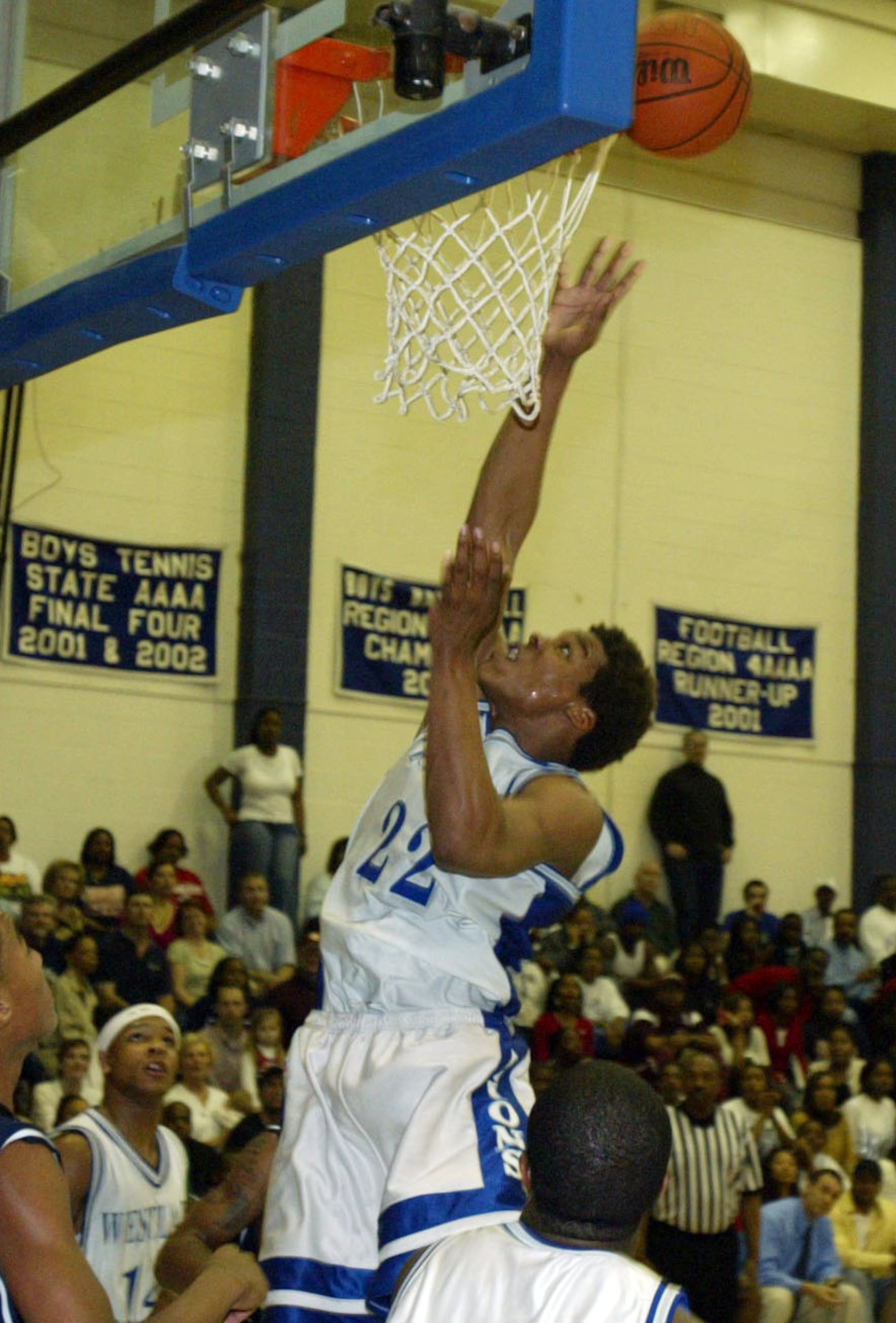 Westlake's Cameron Newton(22) puts up a shot against Dunwoody on January 27, 2006. (Mikki K. Harris/AJC staff)