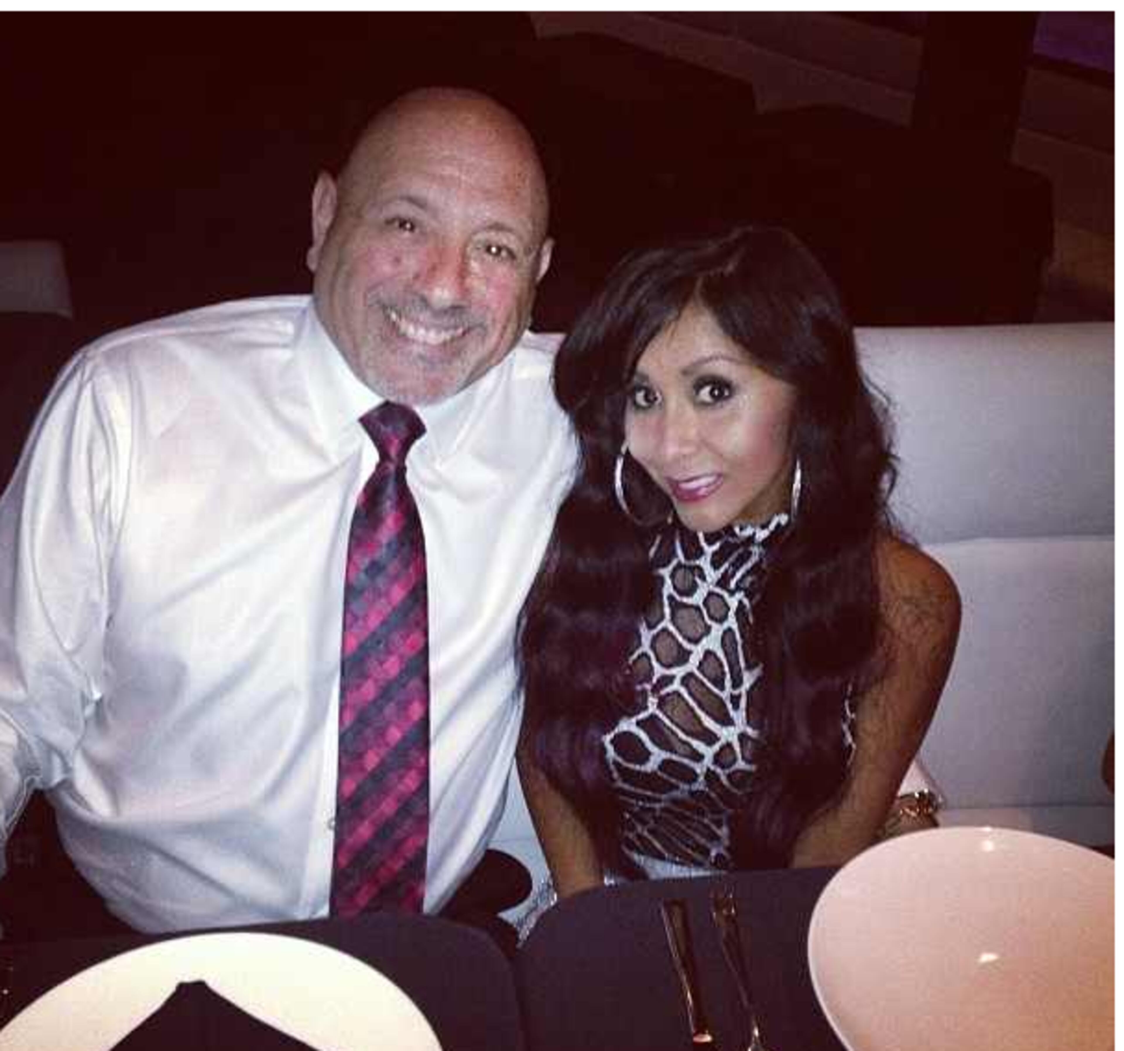 "My dad's the best, he's always been supportive of me whatever I do. I love him!" said "Jersey Shore's" Nicole "Snooki" Polizzi of her father Andy Polizzi aka Papa Snooks. They took this photo at the first Team Snooki Music Live event on June 7 at Passions Nightclub at the Seminole Hard Rock in Hollywood Florida.