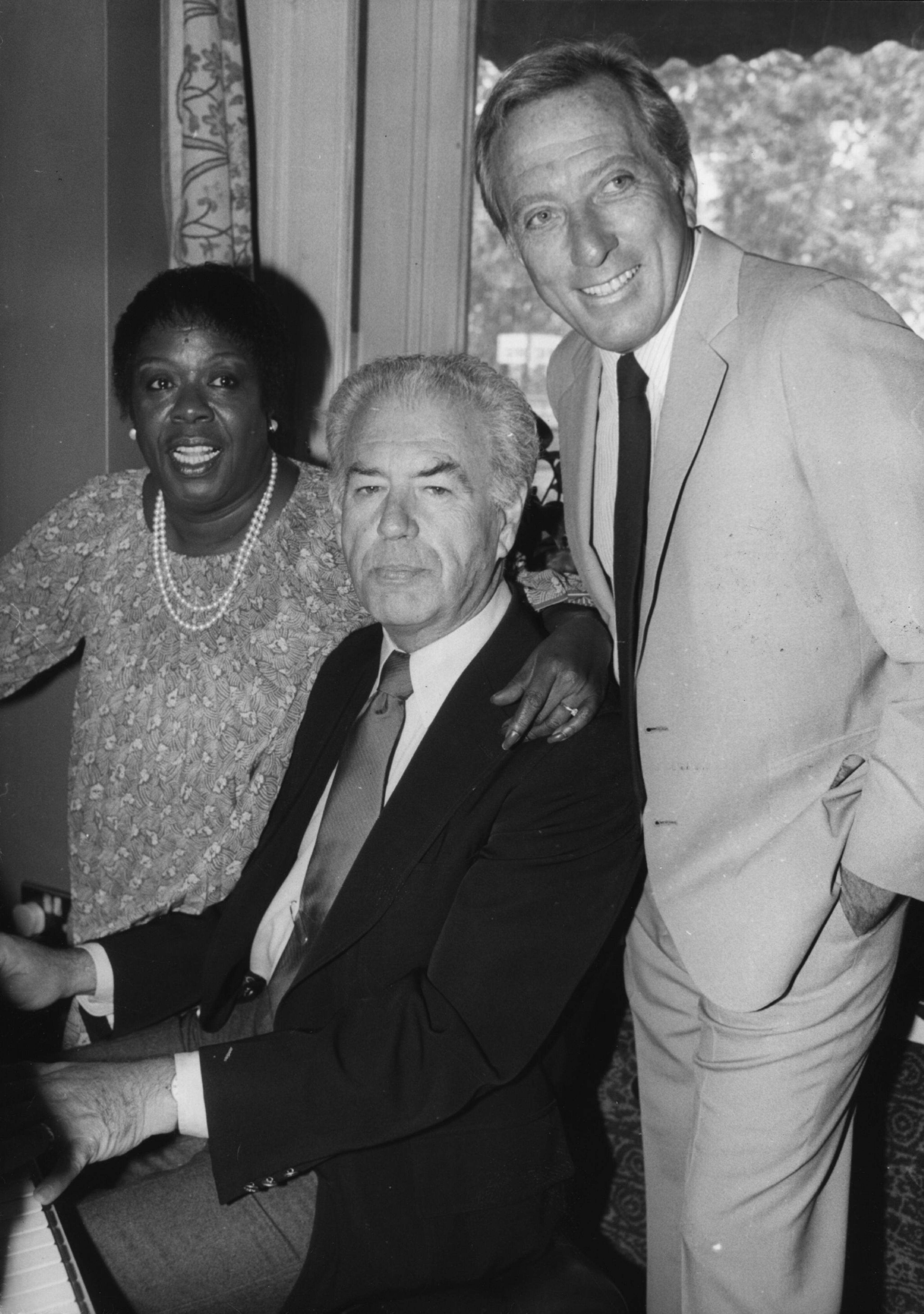 American jazz singer and pianist Sarah 'Sassy' Vaughan (1924 - 1990) with singer Andy Williams (right) and conductor Nelson Riddle who are all to appear in cabaret for the first time together at the Grosvenor House Hotel, London. Original Publication: People Disc - HM0092 (Photo by Central Press/Getty Images)