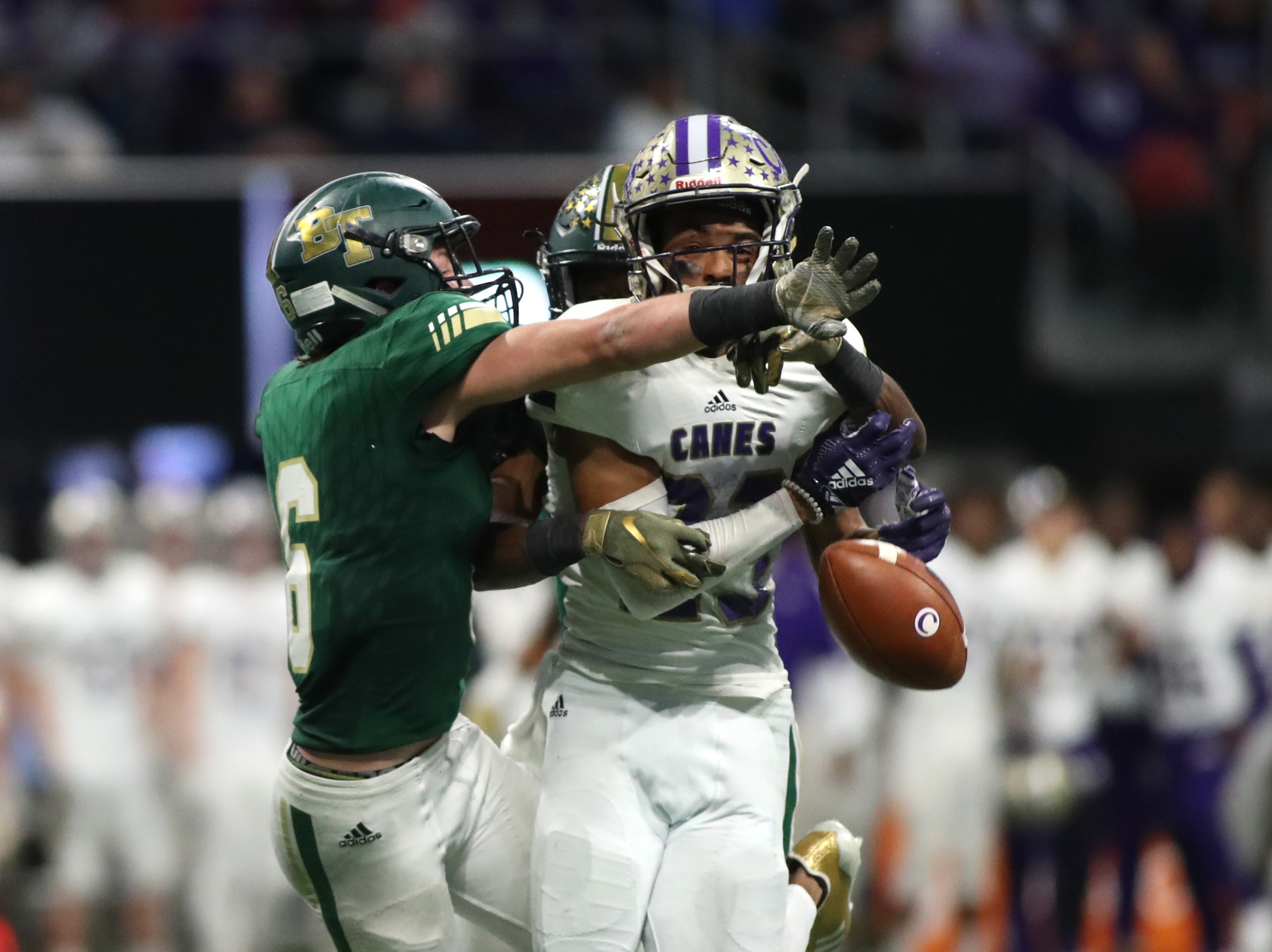 Blessed Trinity defensive back Ryan Davis (6) deflects a pass intended for Cartersville running back Luke Elliott (23) in the first half of the Class AAAA State Championship at Mercedes-Benz Stadium Wednesday, December 12, 2018, in Atlanta. (JASON GETZ/SPECIAL TO THE AJC)