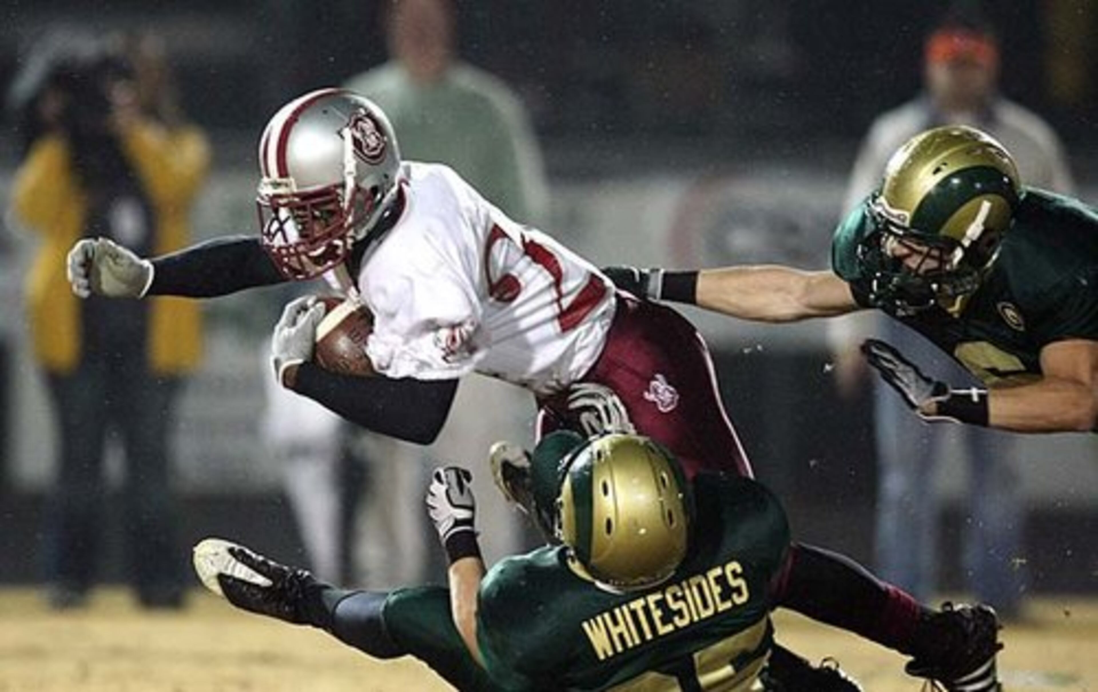 Lowndes DB Greg Reid - Reid (in white), an AJC Super 11 selection and our Player of the Year, backed off an early commitment to Florida and is now a target for several big name schools, including UGA, Miami, Tennessee and Auburn.
