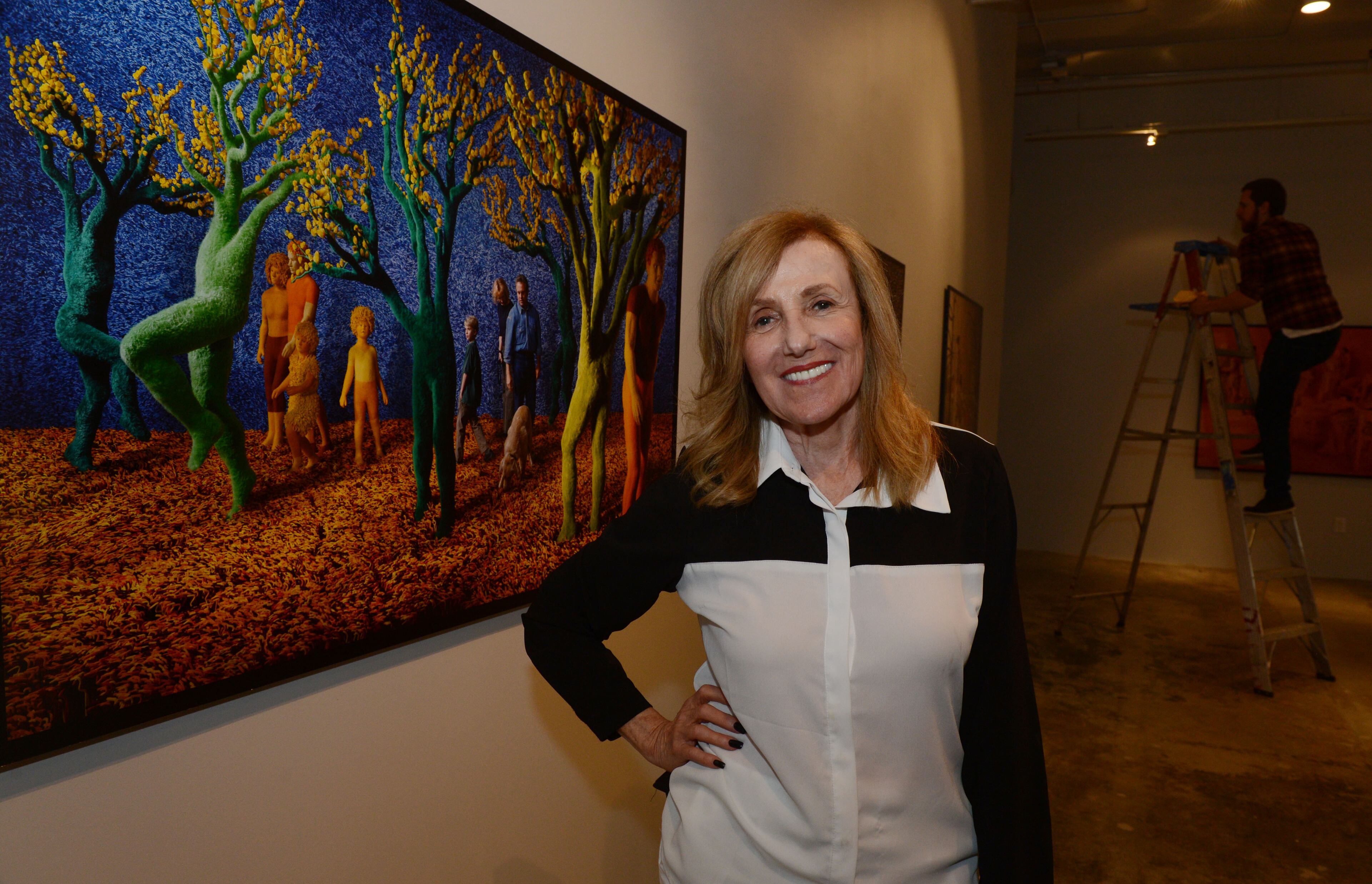 JUNE 26, 2013 ATLANTA Fay Gold, owner of the Fay Gold Gallery, is shown at the gallery under construction Wednesday, June 26, 2013. Having closed her Buckhead gallery after nearly three decades in 2009, 80-something Fay Gold is back in the gallery business. She opens her first show, of photographer Sandy Skoglund, on Thursday night. Her new gallery space is a converted building with a new all-around exterior wall mural by former graffiti artist Hense. KENT D. JOHNSON/KDJOHNSON@AJC.COM