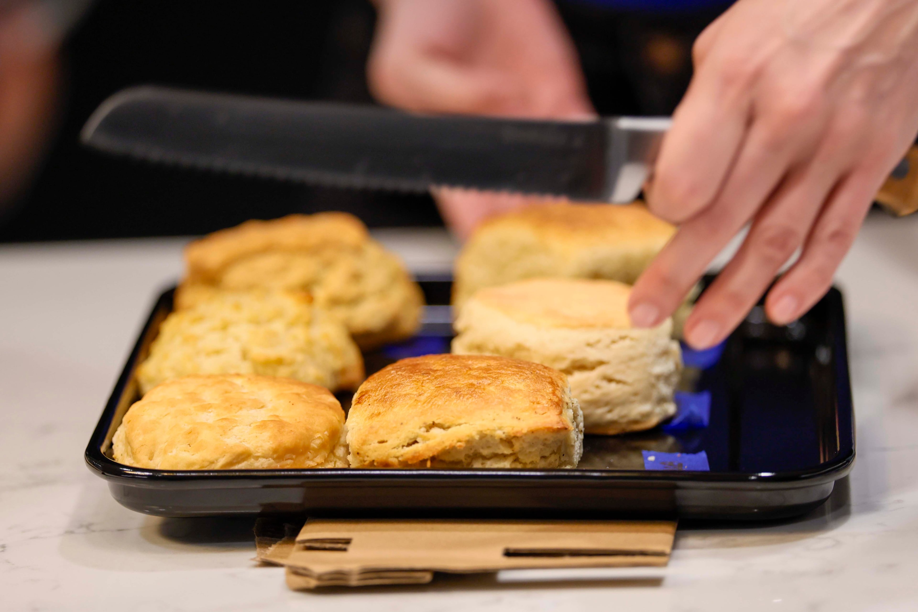 Biscuits from different locations are prepared for a tasting with AJC editors, reporters and staff to determine the best biscuit in Atlanta on Tuesday, April 28, 2026. (Miguel Martinez/AJC)