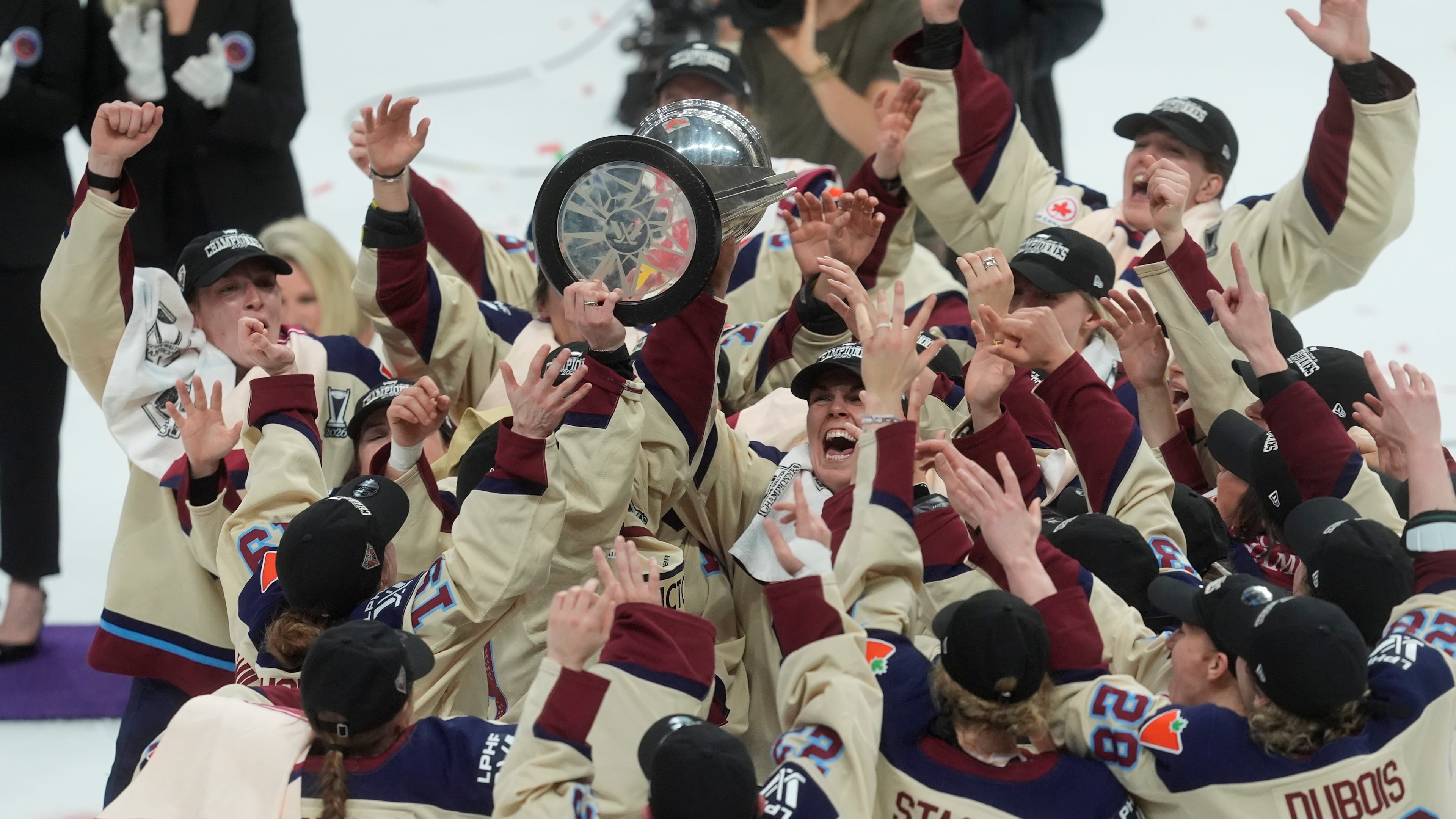 Montreal Victoire players celebrate after defeating the Ottawa Charge to win the PWHL Walter Cup final in Ottawa, Wednesday May 20, 2026. (Adrian Wyld/The Canadian Press via AP)