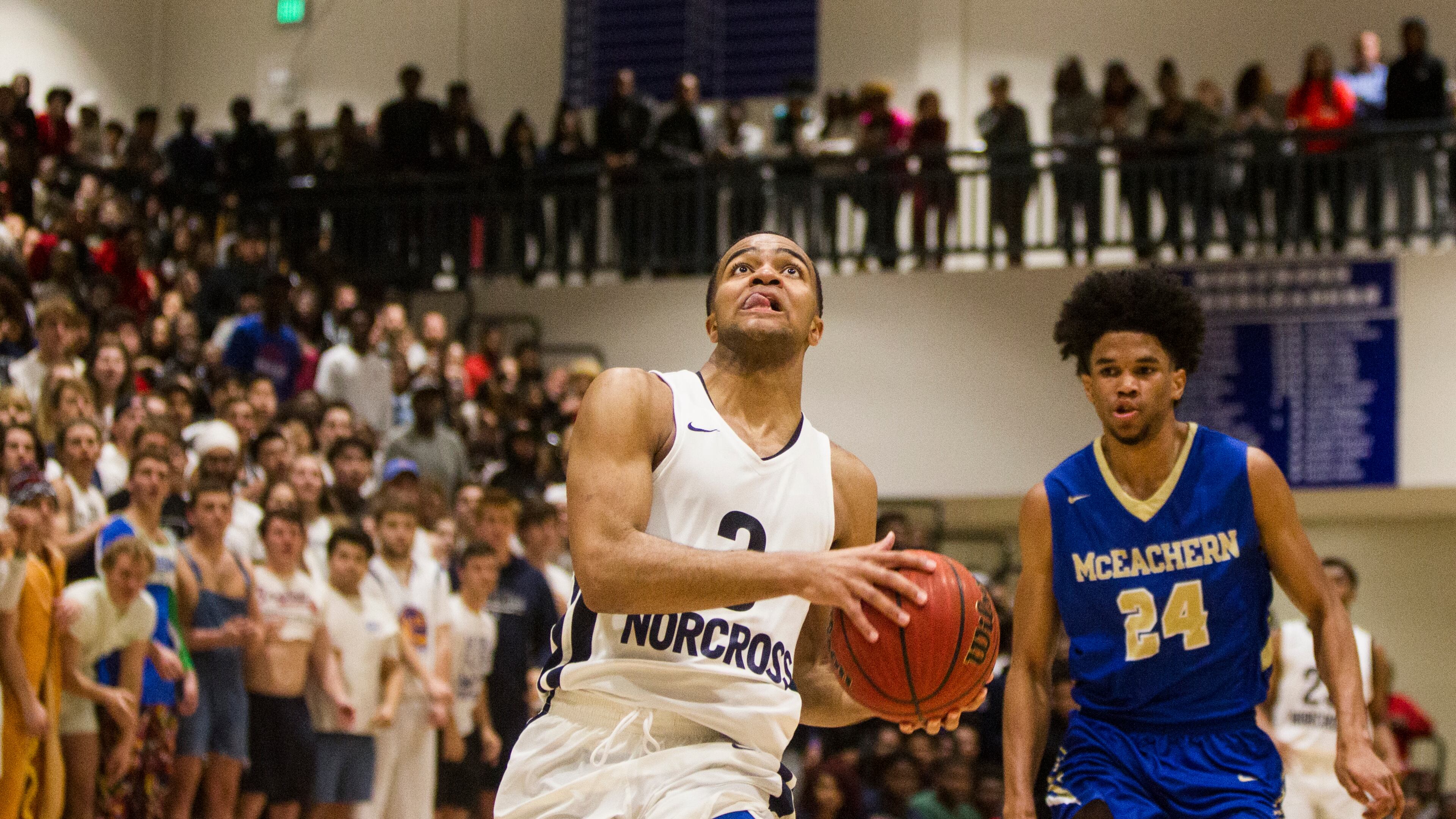 Norcross guard Kyle Sturdivant (3) goes to shoot the ball during the Boys Basketball quarterfinals playoff game between McEachern High and Norcross High at Norcross High School in Norcross, Georgia, on Wednesday, February 28, 2018. (REANN HUBER/REANN.HUBER@AJC.COM)