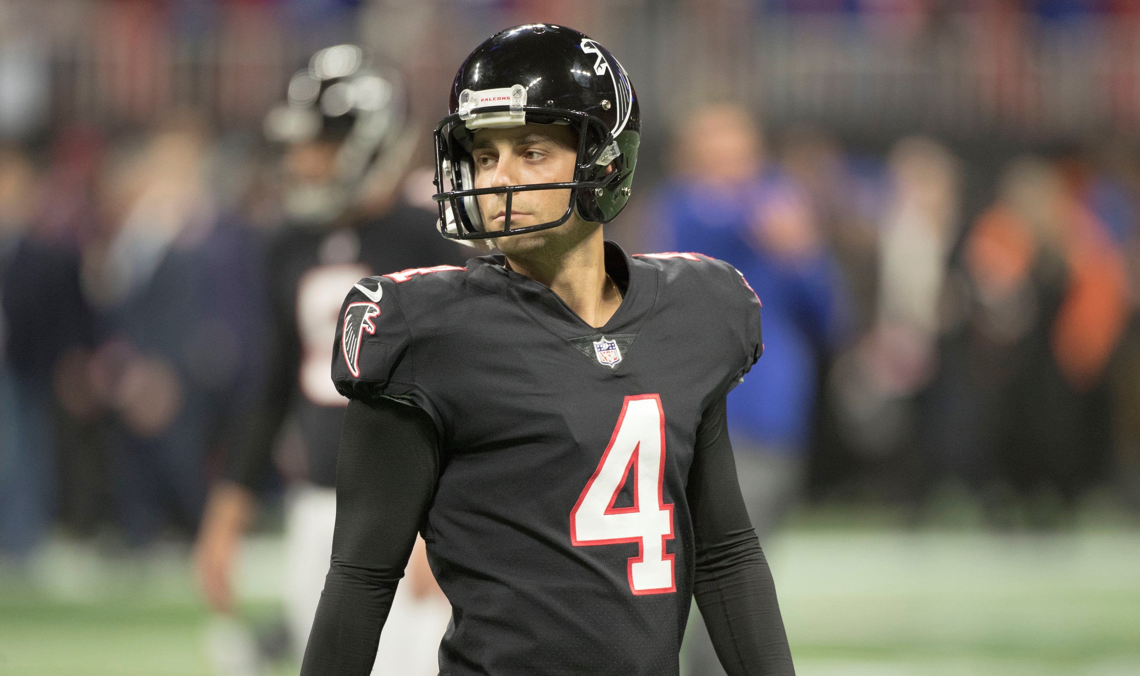 10/22/18 - Atlanta - Atlanta Falcons kicker Giorgio Tavecchio (4) surveys the field during pregame warmups. The Atlanta Falcons played the New York Giants in an NFL football game Monday, October 22, 2018, at Mercedes-Benz Stadium in Atlanta, GA. BOB ANDRES / BANDRES@AJC.COM