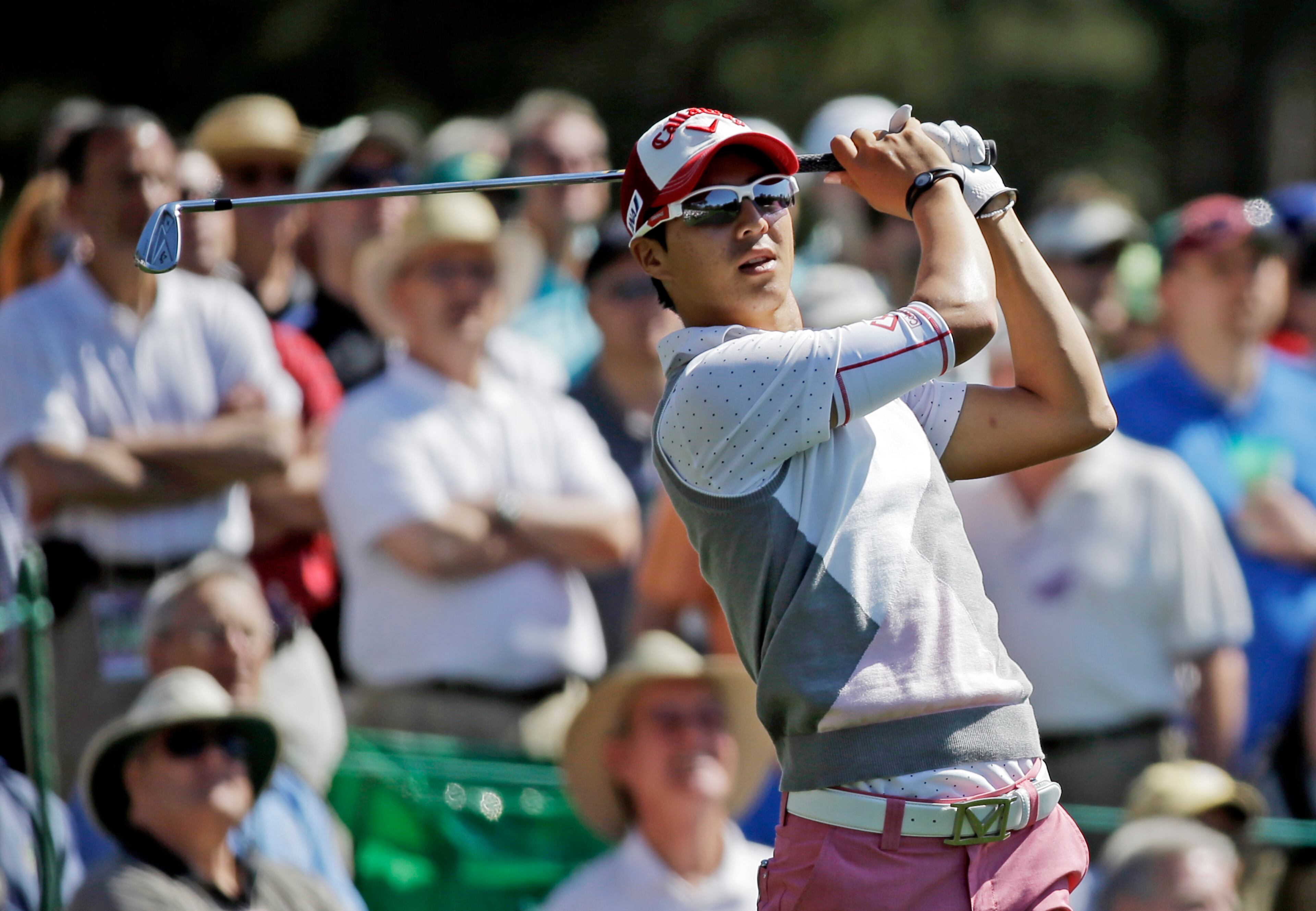 Ryo Ishikawa, of Japan, tees off on the 12th hole during a practice round.