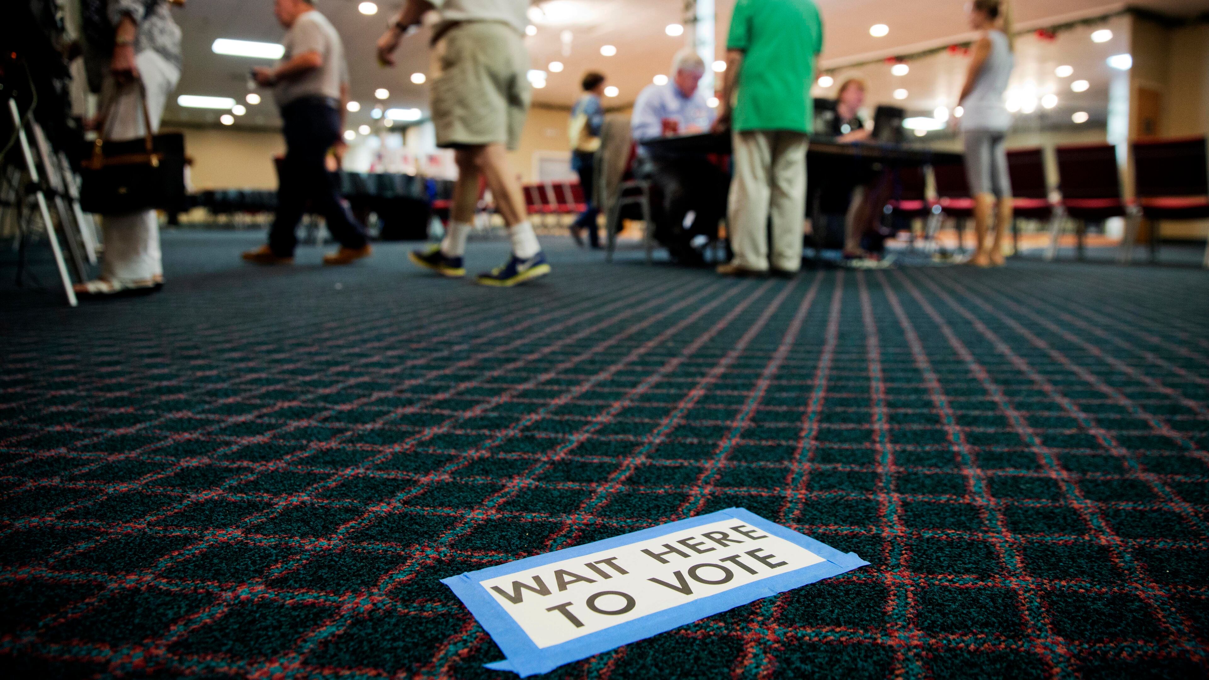 Voters cast their ballots in Georgia's 6th Congressional District special election at a polling site in Sandy Springs, Ga., Tuesday, June 20, 2017. The most expensive House race in U.S. history heads to voters Tuesday in suburban Atlanta. Either Republican Karen Handel will claim a seat that's been in her party's hands since 1979 or Democrat Jon Ossoff will manage an upset that will rattle Washington ahead of the 2018 midterm elections. (AP Photo/David Goldman)