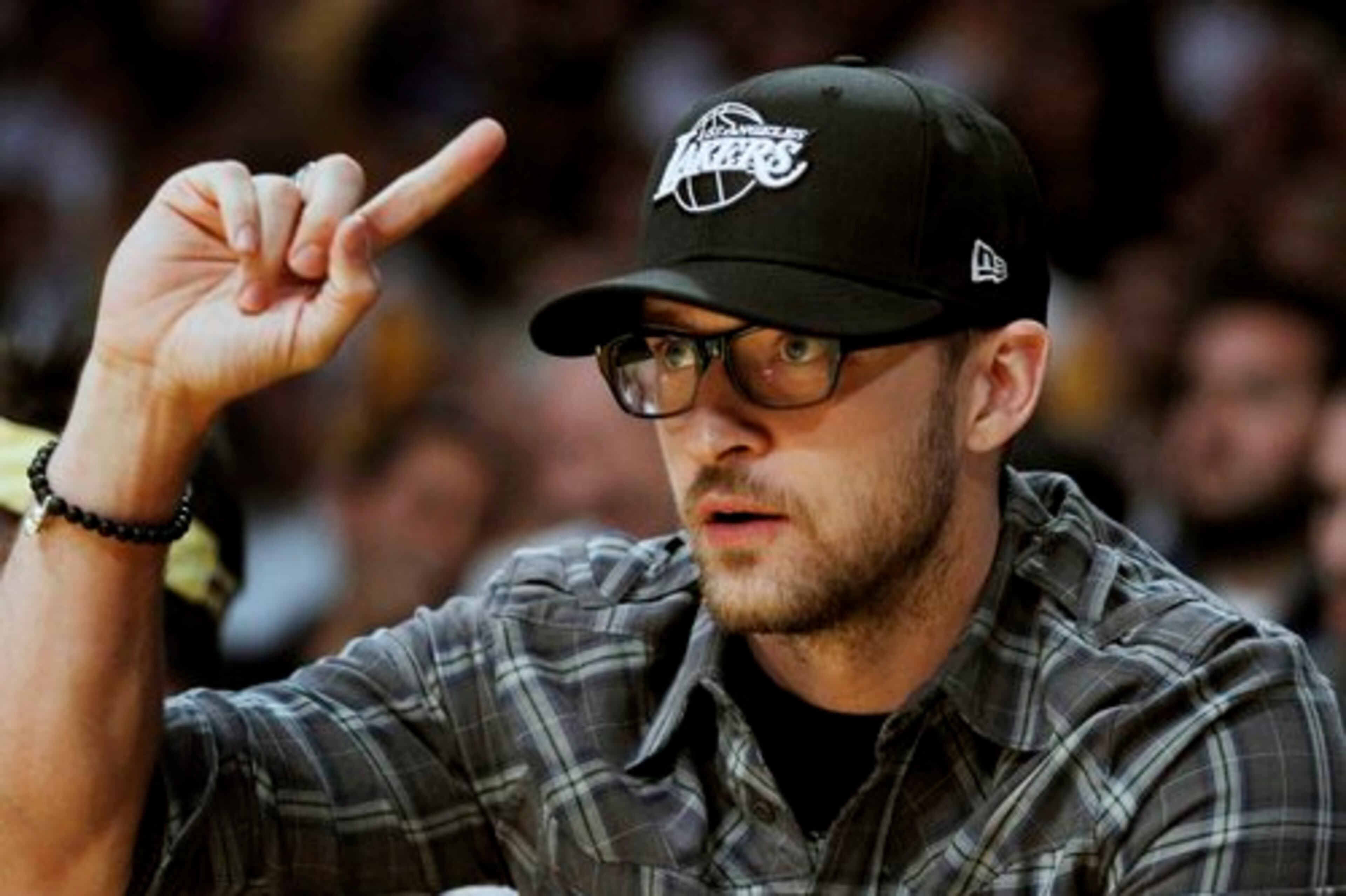 Entertainer Justin Timberlake watches the Los Angeles Lakers and the Boston Celtics play during the first half of Game 2 of the NBA basketball finals Sunday, June 6, 2010, in Los Angeles.