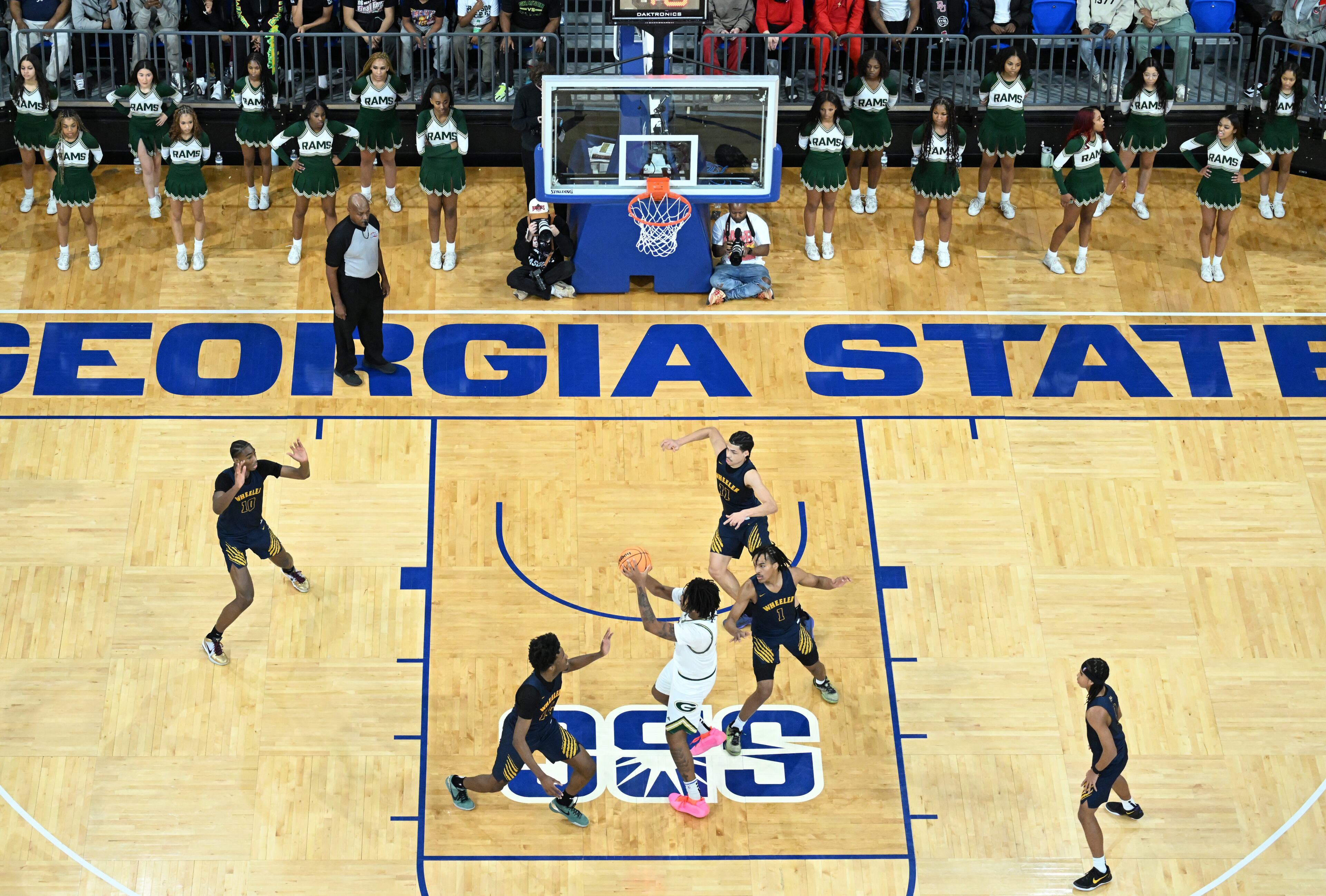 Grayson's Amir Taylor (11) drives to the basket during the second half of the GHSA Class 6A Boys State Basketball playoffs game at the Georgia State Convocation Center, Saturday, March 1, 2025, in Atlanta. Wheeler won 68-53 over Grayson. (Hyosub Shin / AJC)