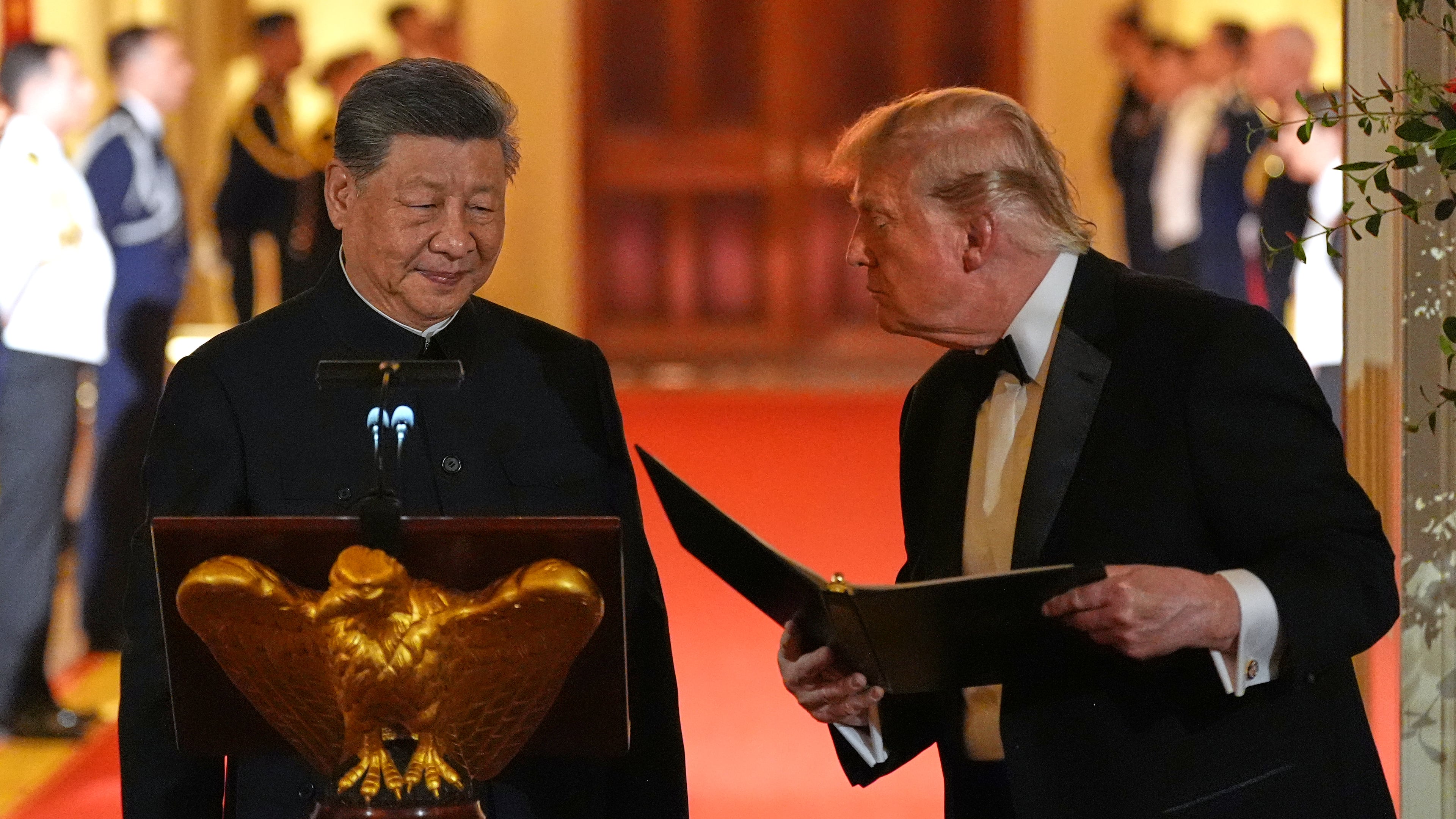 President Donald Trump talks with China's President Xi Jinping during a State Dinner in the East Room of the White House, Thursday, Sept. 24, 2026, in Washington. (AP Photo/Alex Brandon)