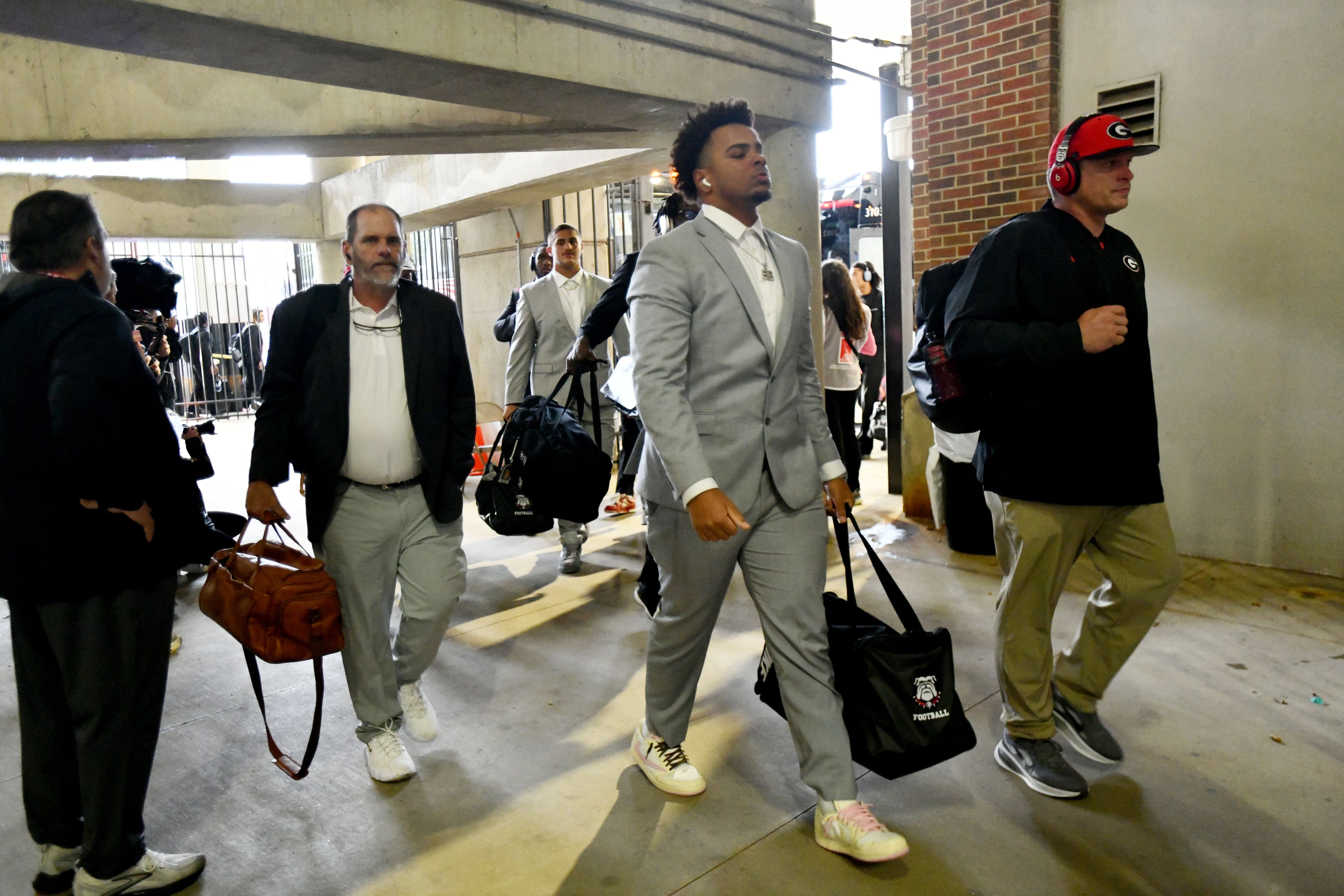 Georgia players and coaching staff arrive before an NCAA football game against Alabama at Bryant-Denny Stadium on Saturday, Oct. 10, 2026, in Tuscaloosa, Alabama. (Hyosub Shin/AJC)