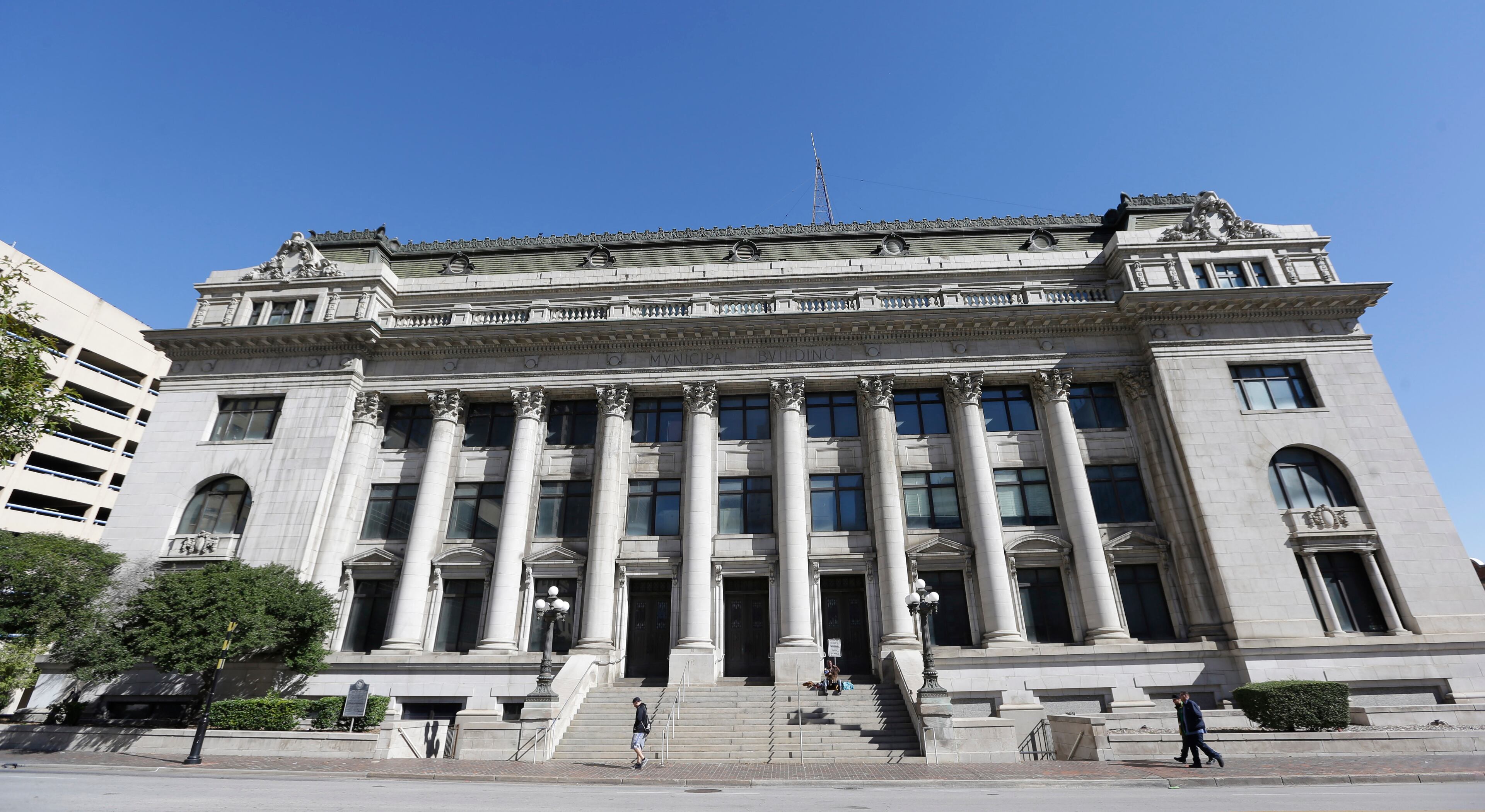 The Dallas Municipal Building is shown in downtown Dallas in 2013. Also known as "Old City Hall," it was in the parking garage of this building that nightclub owner Jack Ruby killed Lee Harvey Oswald as he was being transferred, and in top floor jail where Oswald was held. The building served as city hall until the late 1970s and included the police department and jail. The Oswald related spots are not accessible to the public, but the building still houses the Municipal Court. (AP Photo/LM Otero)