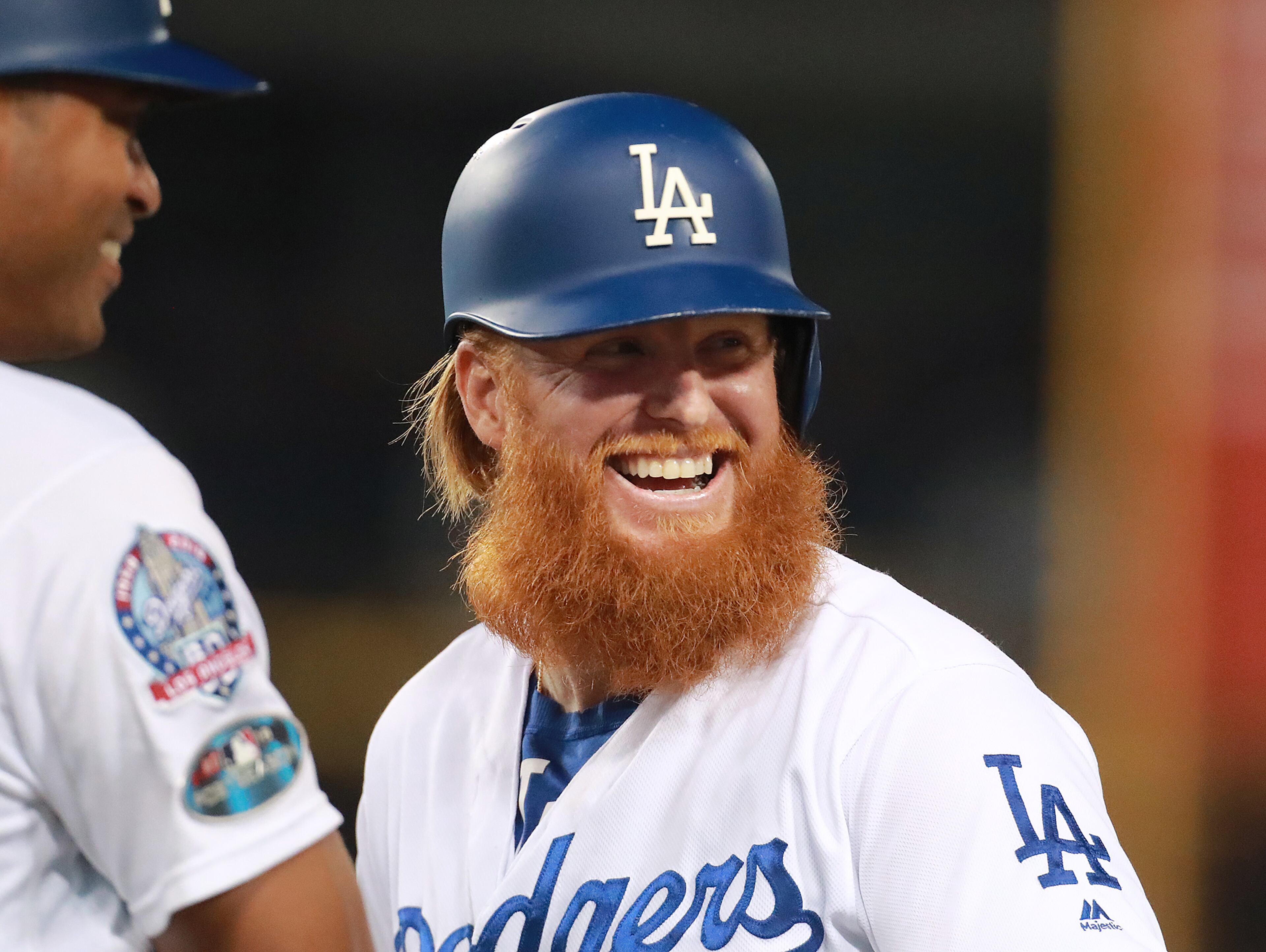 October 5, 2018 Los Angeles: Los Angeles Dodgers Justin Turner is all smiles after a single against the Atlanta Braves during a 3-0 shutout in Game 2 of a National League Division Series baseball game on Friday, Oct 5, 2018, in Los Angeles. Curtis Compton/ccompton@ajc.com