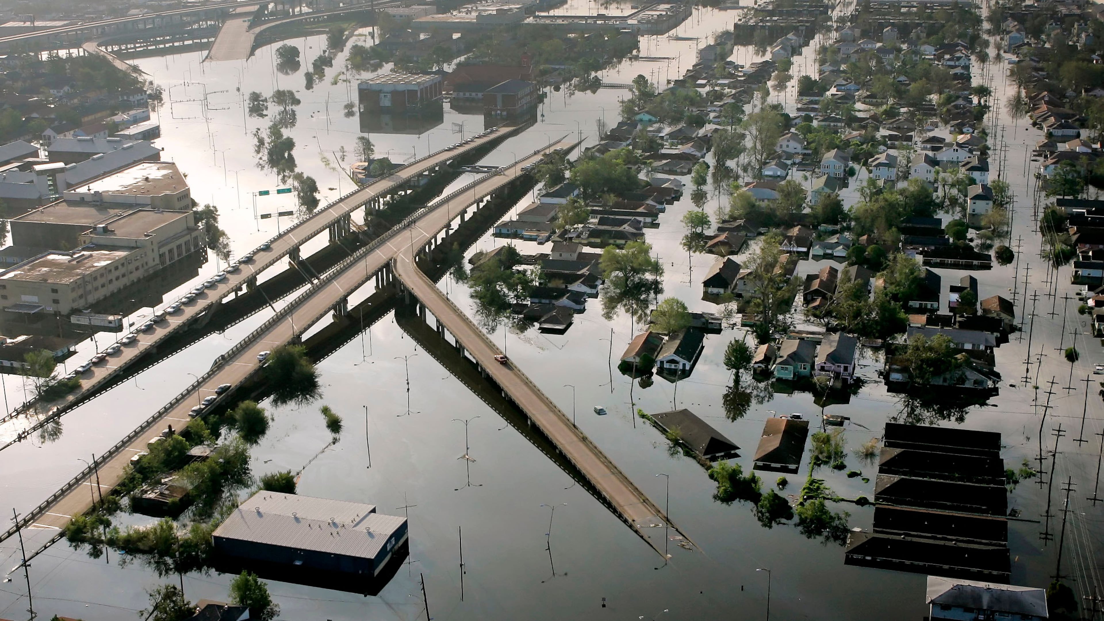 FILE - Floodwaters from Hurricane Katrina fill the streets near downtown New Orleans on Aug. 30, 2005. (AP Photo/David J. Phillip, File)
