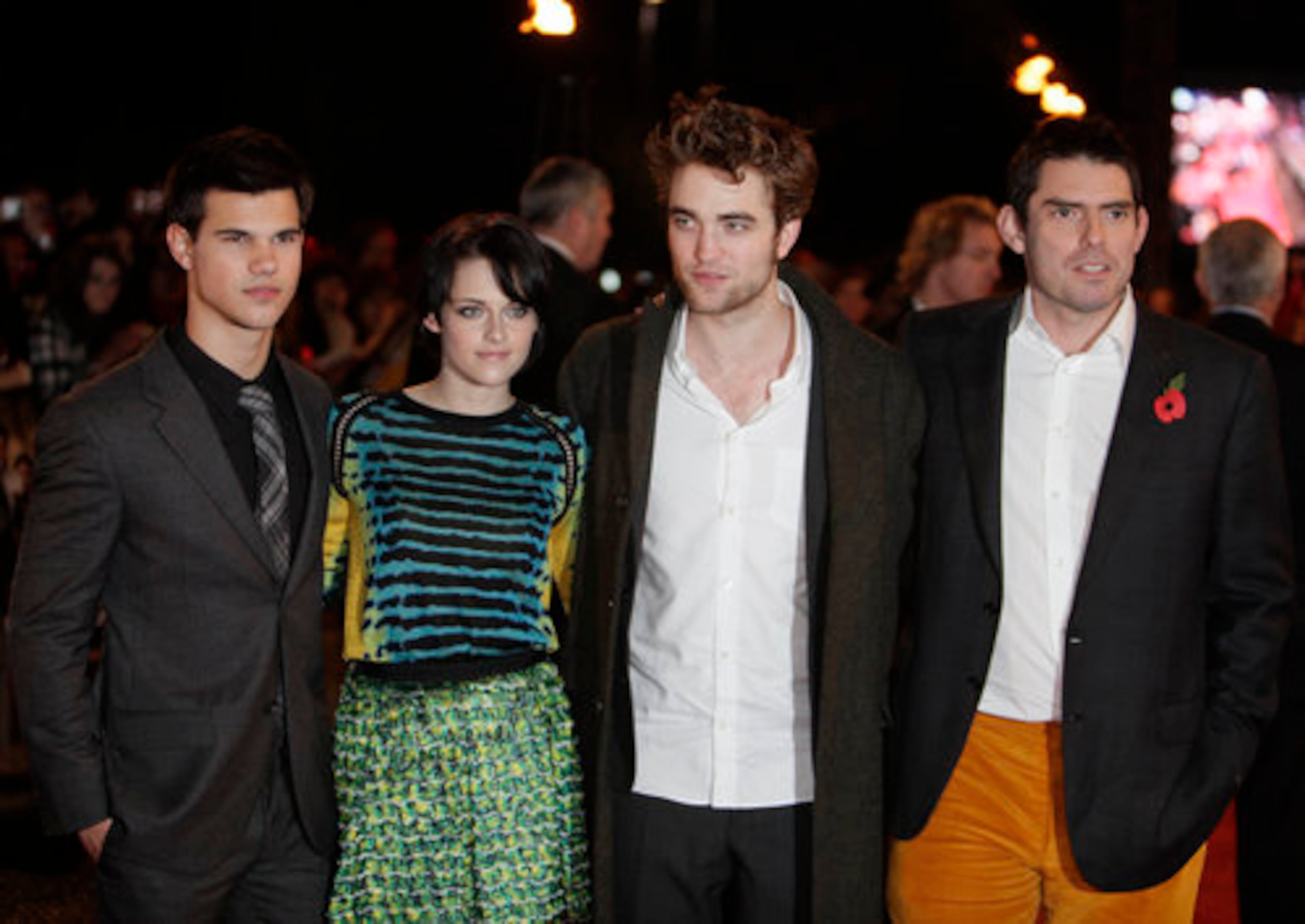 From left to right, Taylor Lautner, Kristen Stewart, British actor Robert Pattinson and director Chris Weitz pose prior to the UK fan party.