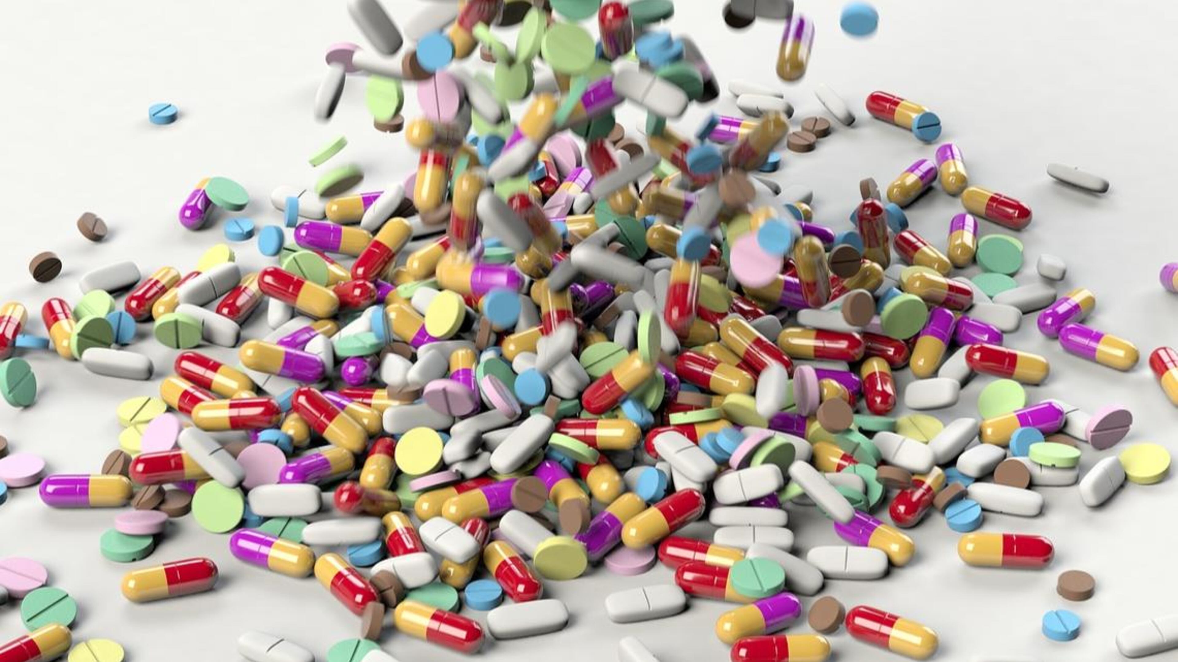 A bar owner in Michigan and two of his waitresses are accused of selling pills illegally.