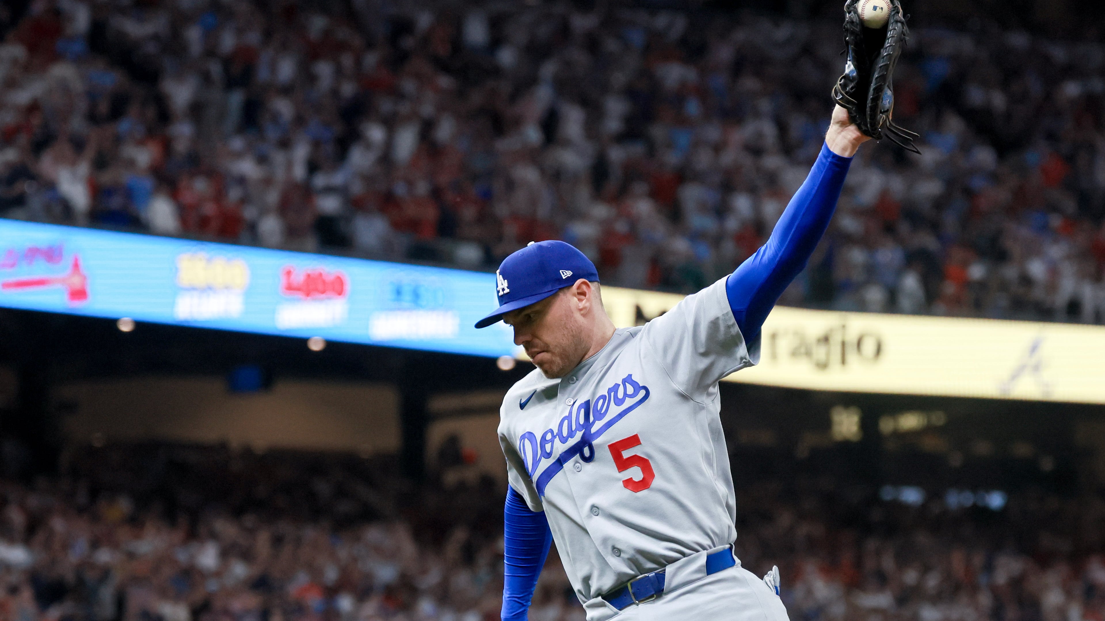 Dodgers first baseman Freddie Freeman celebrates after recording the final out against the Braves during Game 3 of their National League Division Series on Tuesday, Oct. 6, 2026, in Atlanta. (Jason Getz/AJC)