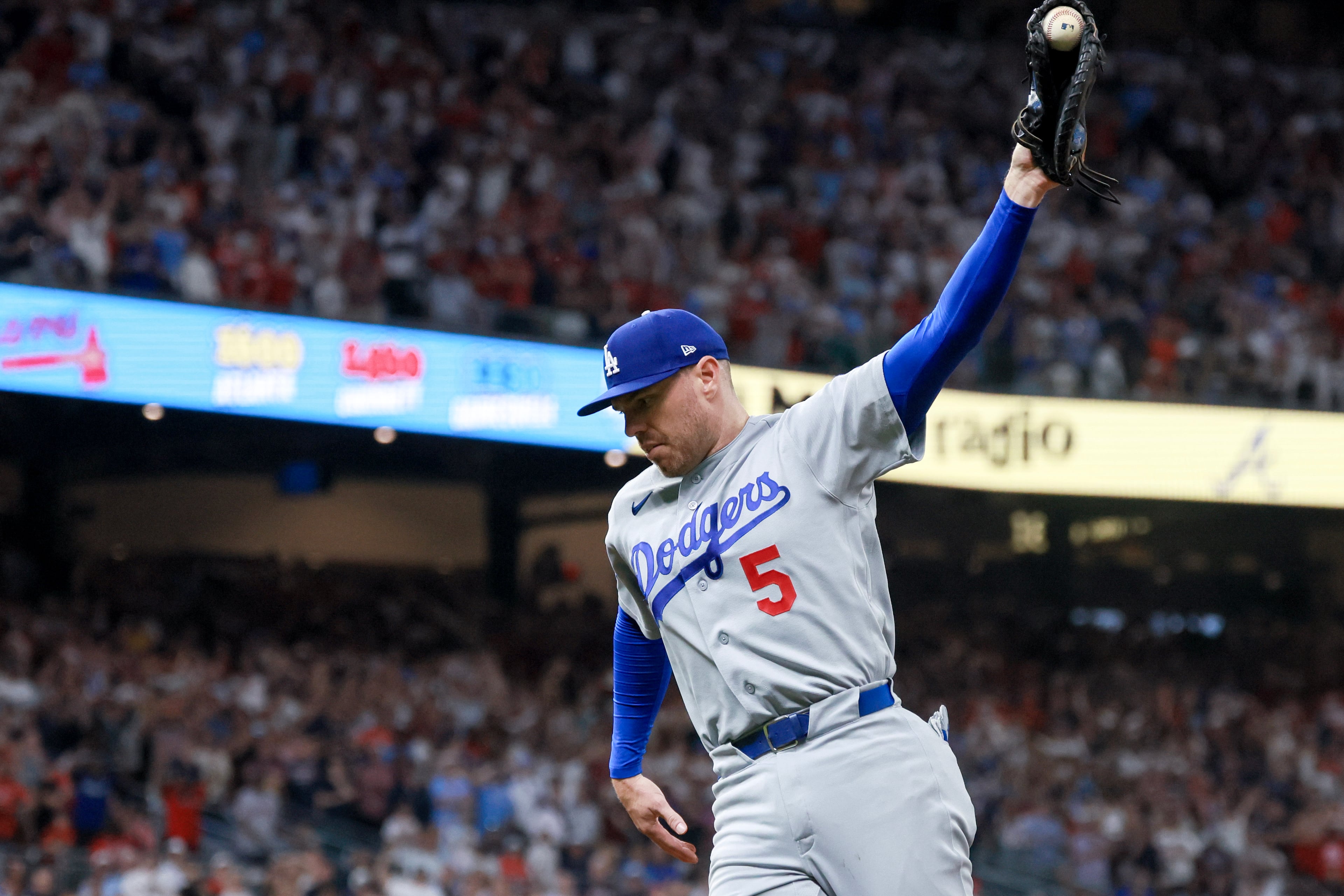 Los Angeles Dodgers first baseman Freddie Freeman (5) reacts after recording the final out against the Atlanta Braves during the ninth inning of Game 3 of the MLB National League Division Series between the Atlanta Braves and the Los Angeles Dodgers, Tuesday, Oct. 6, 2026, in Atlanta. (Jason Getz/AJC)
