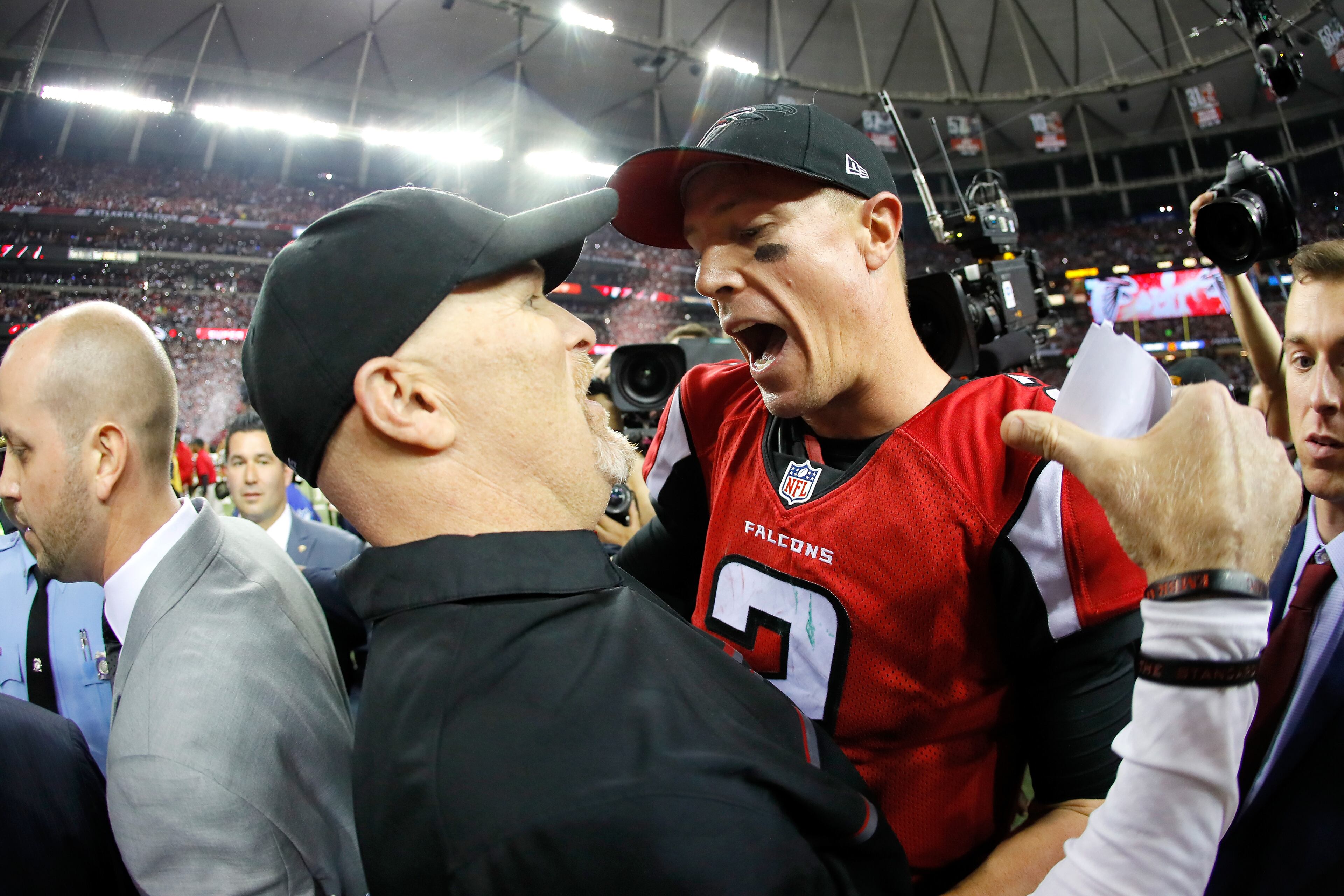 ATLANTA, GA - JANUARY 22: Head coach Dan Quinn and Matt Ryan #2 of the Atlanta Falcons celebrate after defeating the Green Bay Packers in the NFC Championship Game at the Georgia Dome on January 22, 2017 in Atlanta, Georgia. The Falcons defeated the Packers 44-21. (Photo by Kevin C. Cox/Getty Images) *** BESTPIX ***