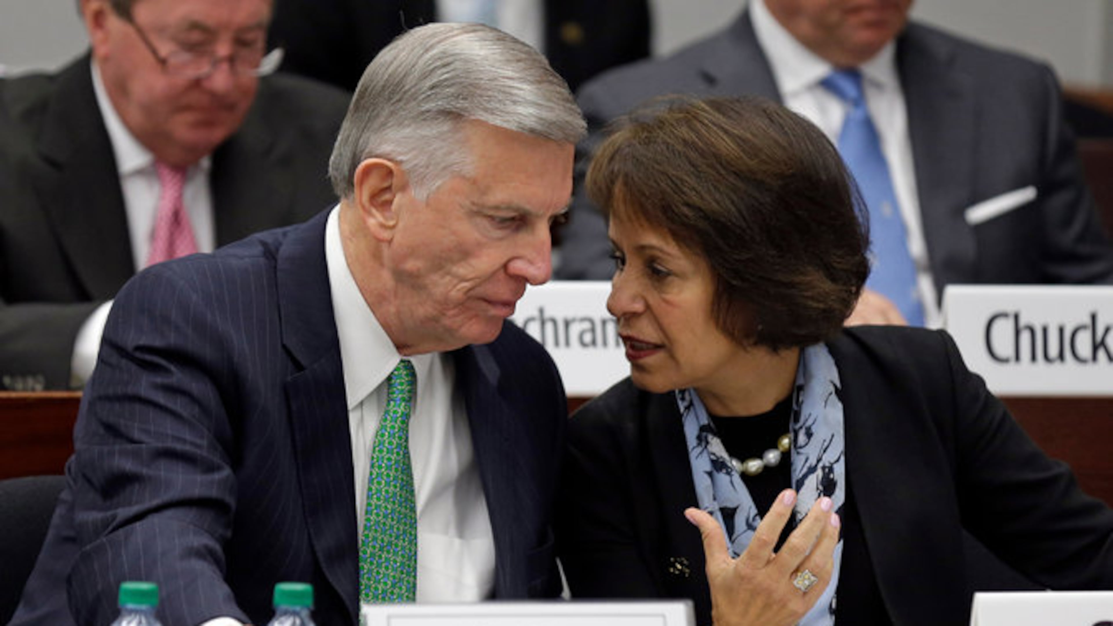 University of North Carolina president Tom Ross and chancellor Carol Folt. (Gerry Broome/Associated Press)