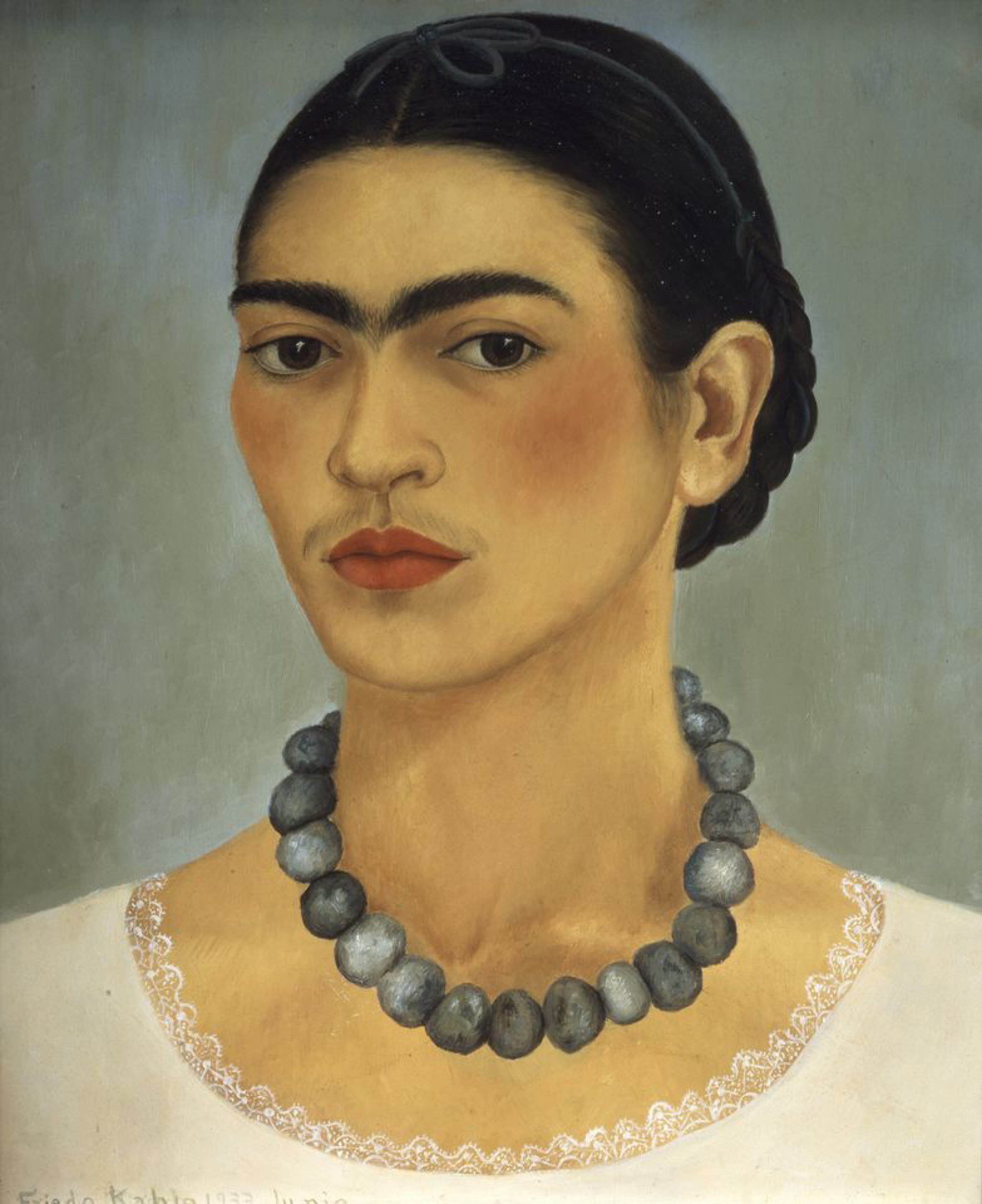 Frida Kahlo's "Autorretrato Con Collar (Self - Portrait with Necklace)," in an oil on metal painting from 1933. The painting is part of the exhibit "Frida & Diego: Passion, Politics and Painting," running at the High Museum from Feb. 14-May 12, 2013.
