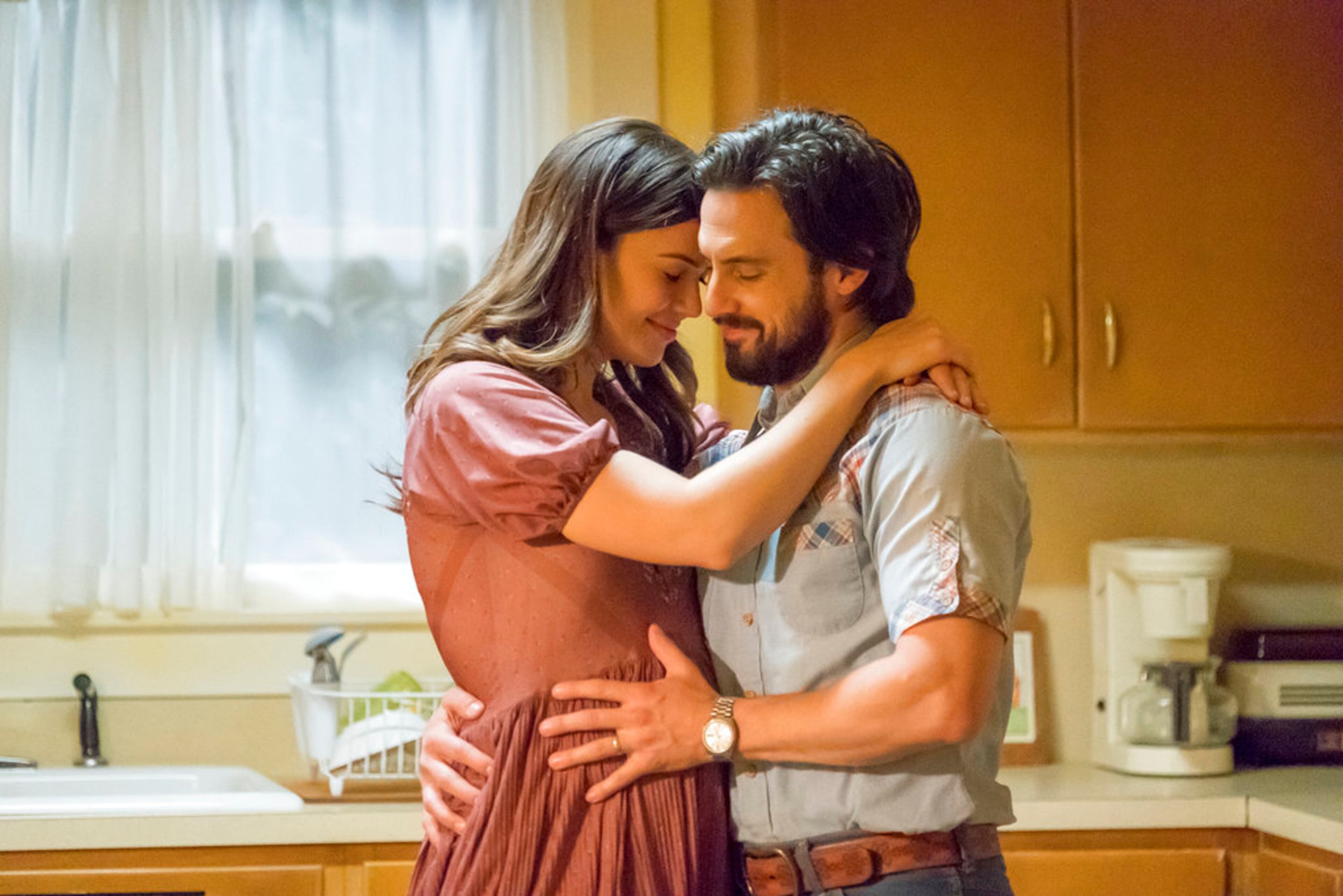 This image released by NBC shows Mandy Moore, left, and Milo Ventimiglia in a scene from "This Is Us." The program was nominated for an Emmy on Thursday for outstanding drama series. The 70th Emmy Awards will be held on Monday, Sept. 17. (Ron Batzdorff/NBC via AP)