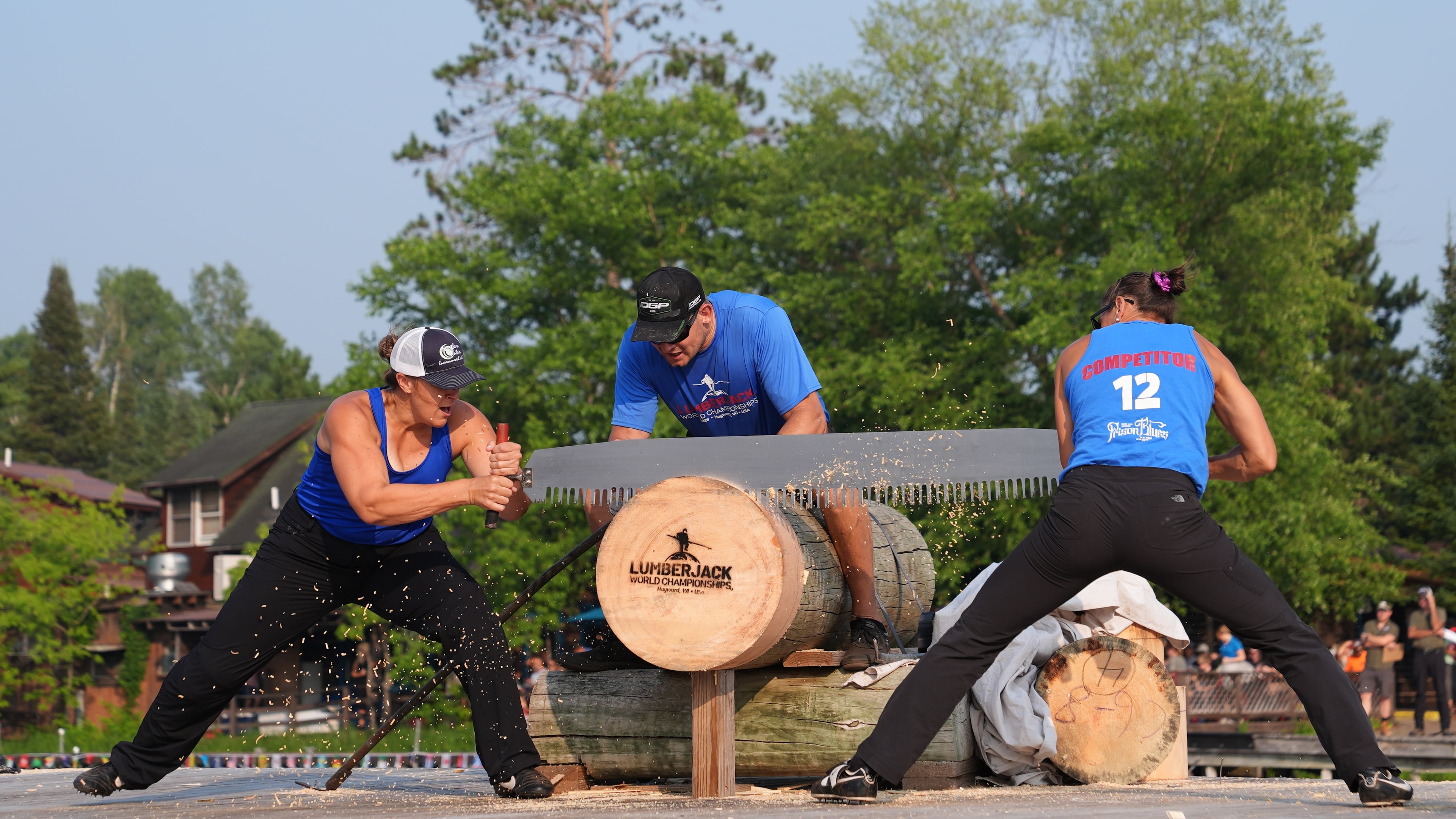 Kate Witkowski, left, and Erin Lavoie compete in the Jill and Jill event during the Lumberjack World Championships, Saturday, July 18, 2026, in Hayward, Wis. (AP Photo/Ellen Schmidt)