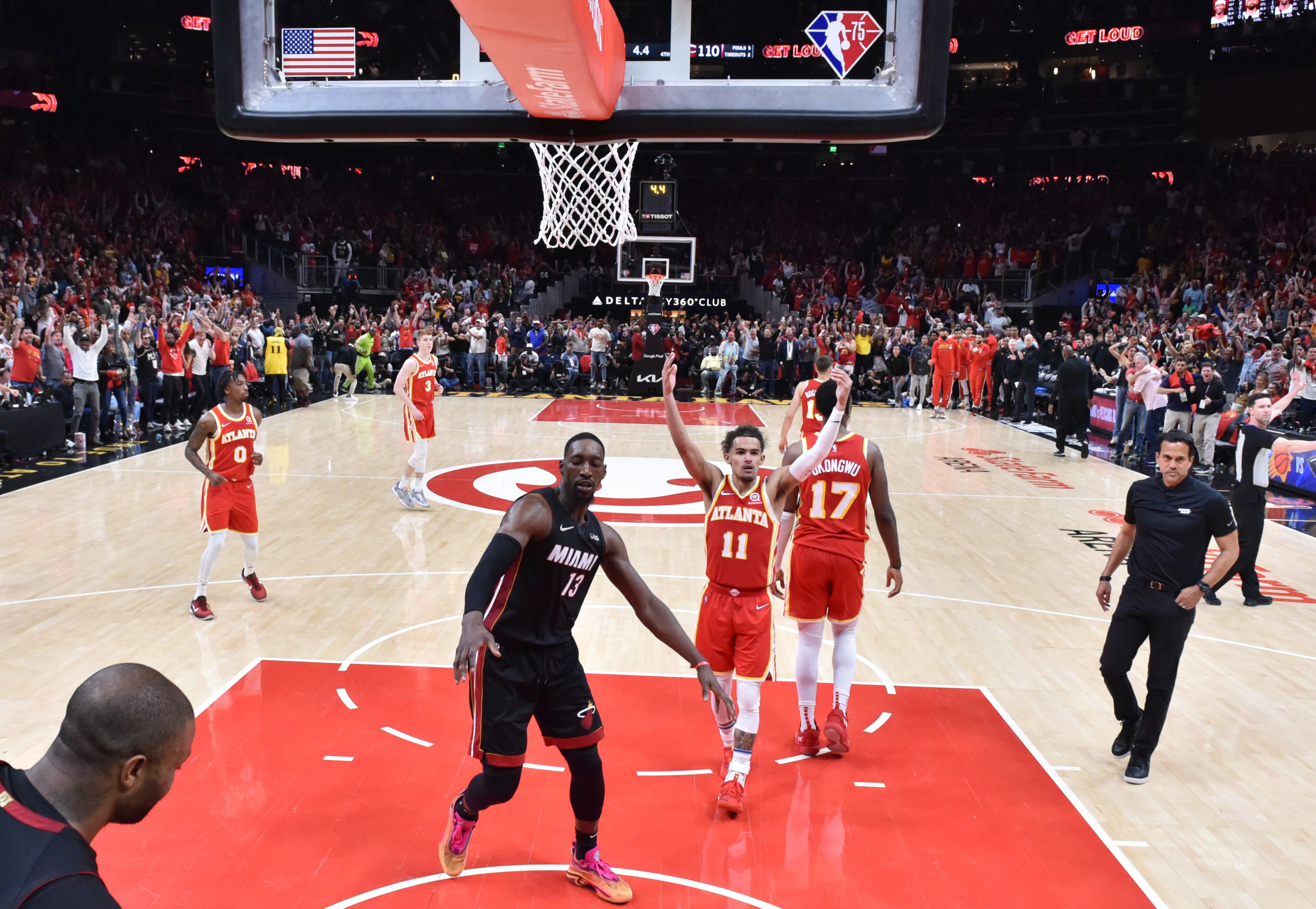 April 22, 2022 Atlanta - Atlanta Hawks' guard Trae Young (11) celebrates after scoring the game winning shot over Miami Heat's forward Jimmy Butler (22) at the end of the 4th quarter in Game 3 of the first round of the NBA playoffs at State Farm Arena on Friday, April 22, 2022. Atlanta Hawks won 111-110 over Miami Heat. (Hyosub Shin / Hyosub.Shin@ajc.com)