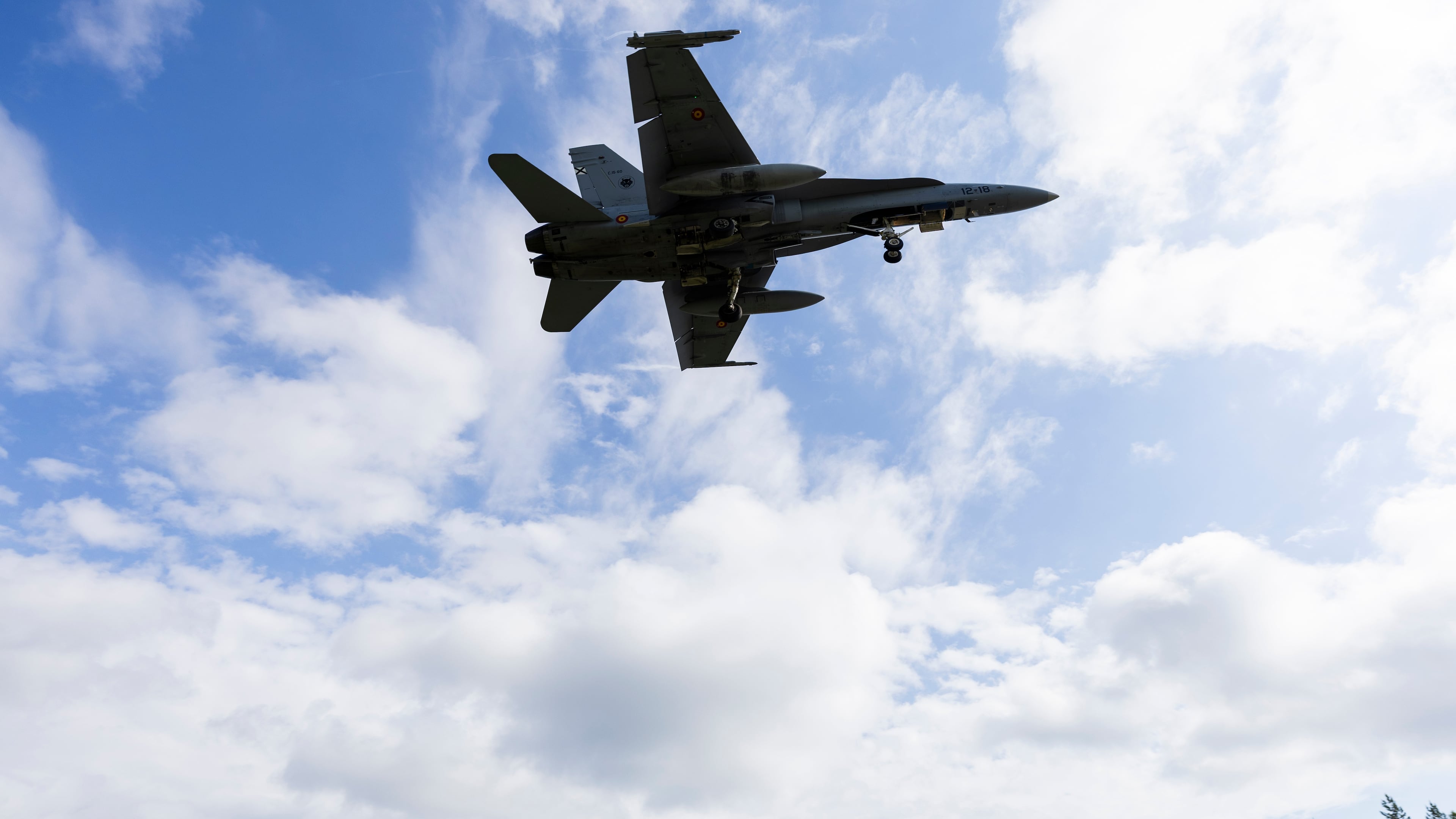 A F/A-18 Hornet multi-role fighter of the Finnish Air Force lands on a road strip during NATO's Ramstein Flag 26 exercise in Tervo, Finland, Wednesday June 10, 2026. (Matias Honkamaa/Lehtikuva via AP)